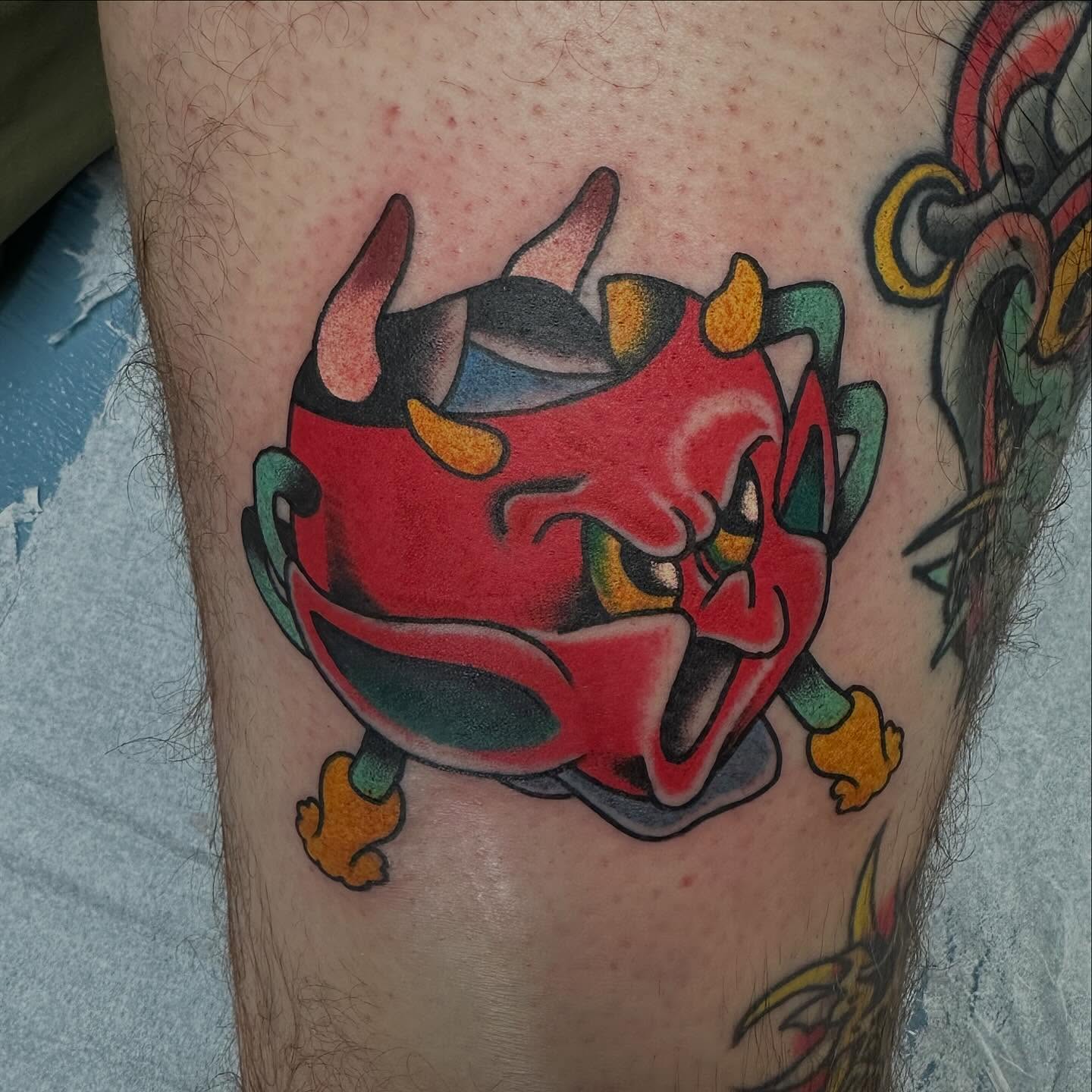 Demon American traditional tattoo on the leg by Devin Spenny