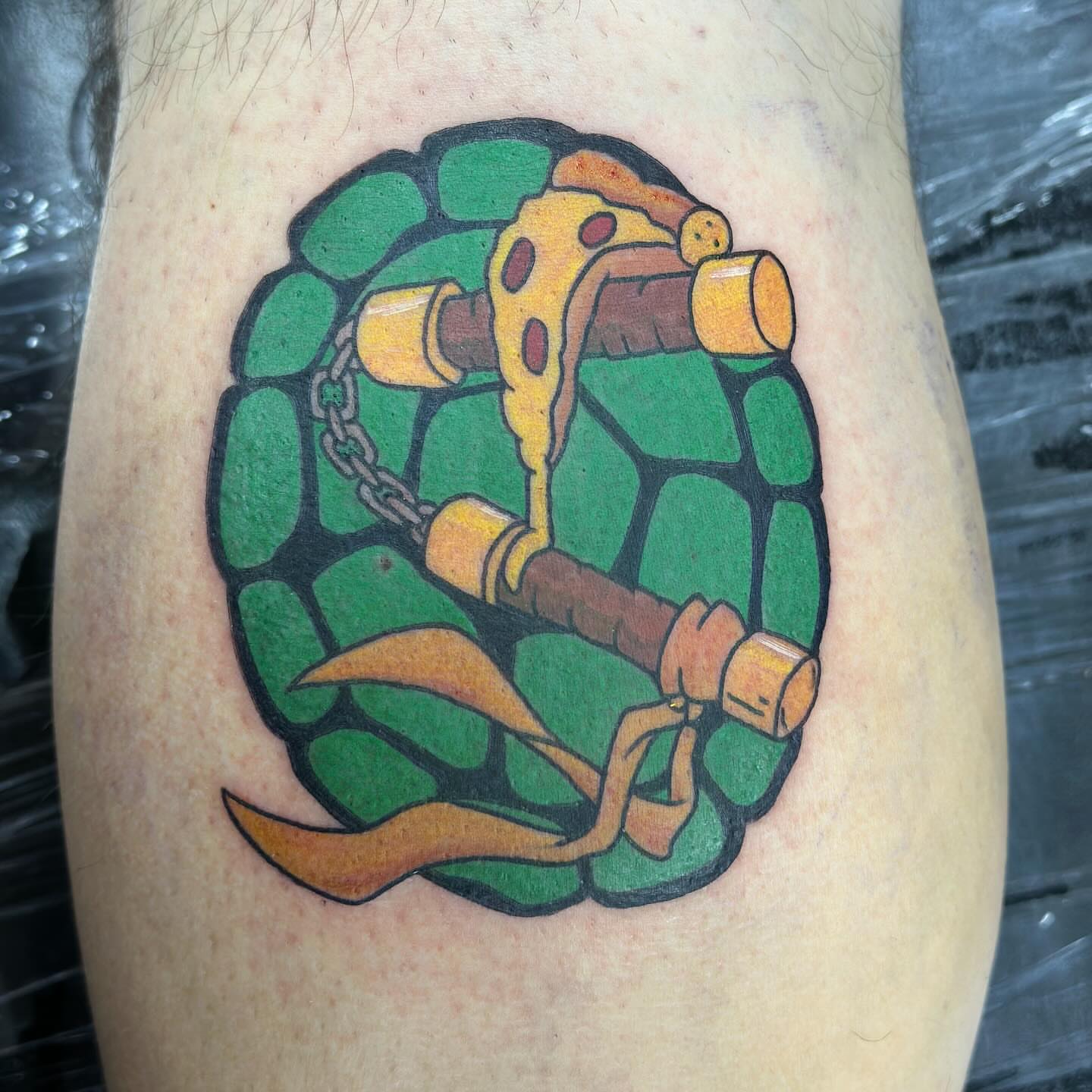 Tortoise with cheese American traditional tattoo on the thigh by Olivia Norbert