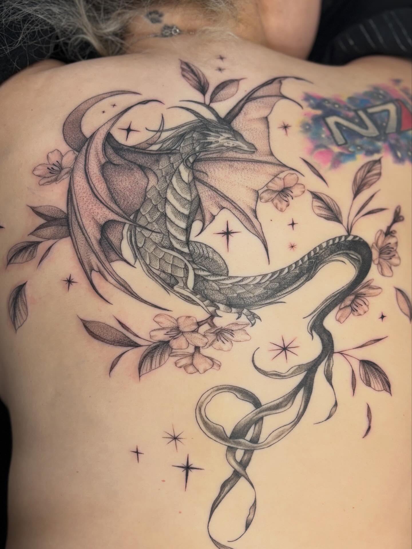 Dragon realism tattoo on the back by Jazzlyn Hous