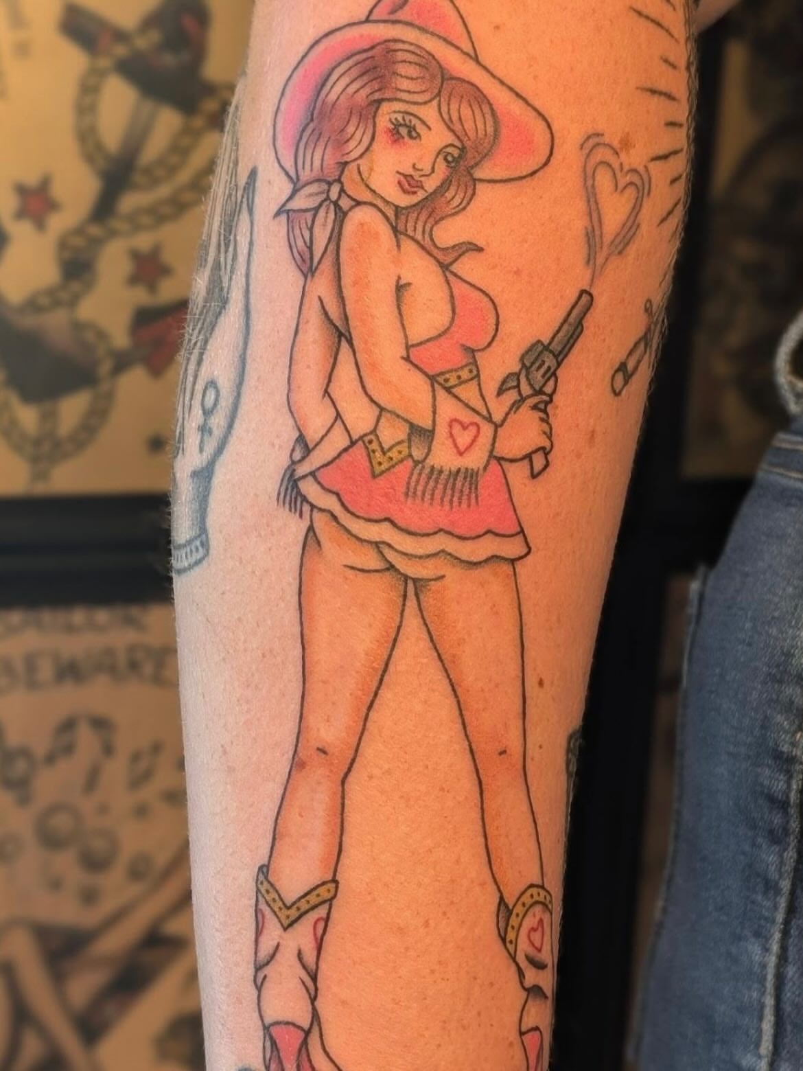 Cowgirl American traditional tattoo on the forearm by Alexandria Green