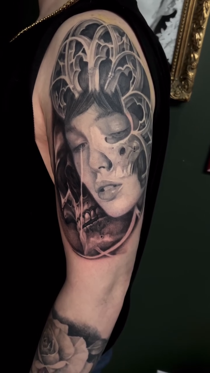 Tattoo by @the_buza — dark_realism, black_and_grey