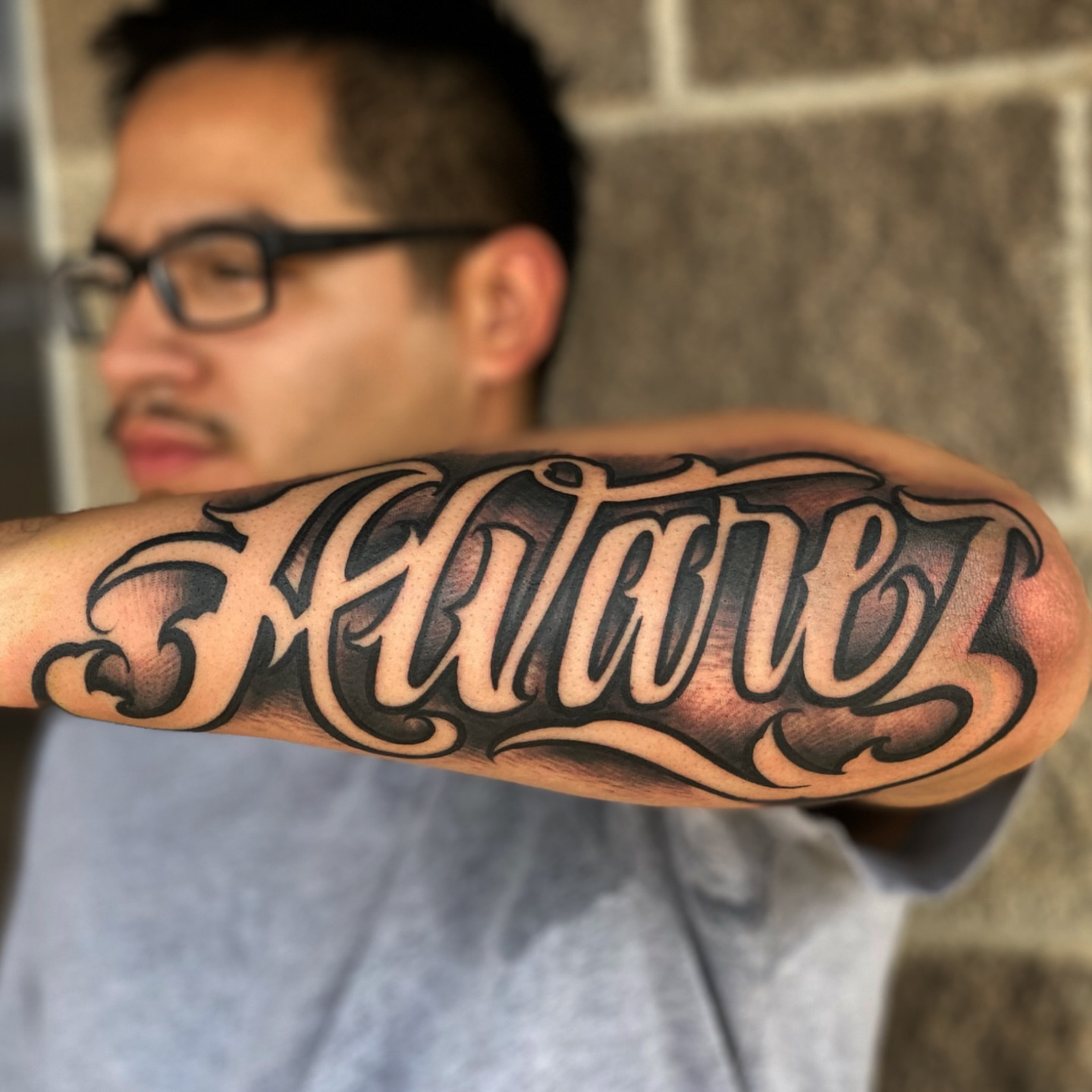 Script lettering lettering script tattoo on the forearm by Lex Miranda