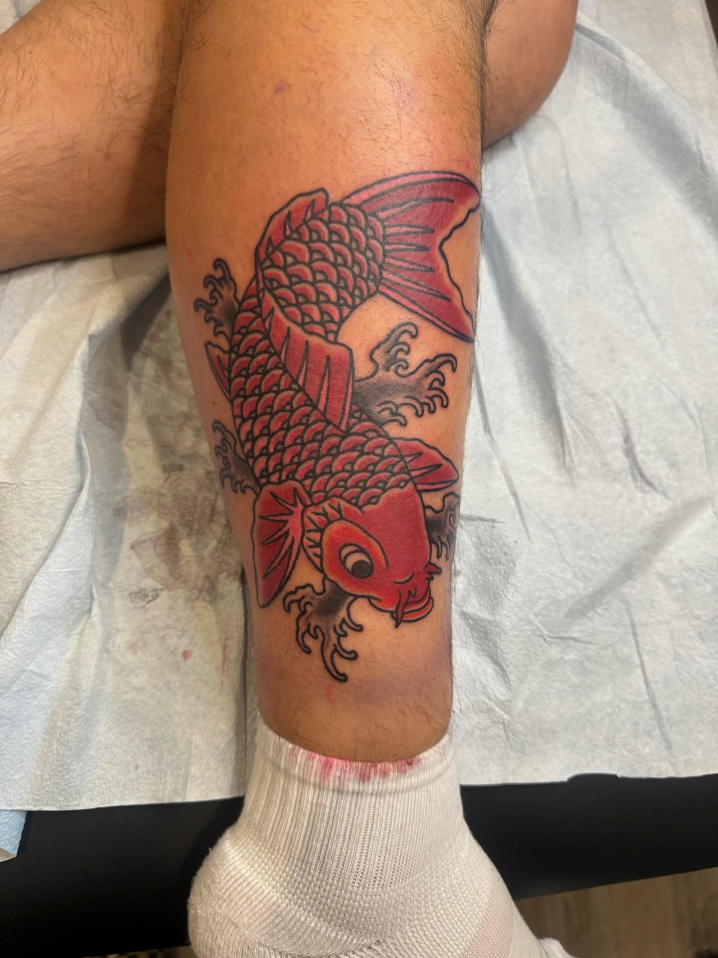 Koi fish japanese irezumi tattoo on the calf by Minneapolis
