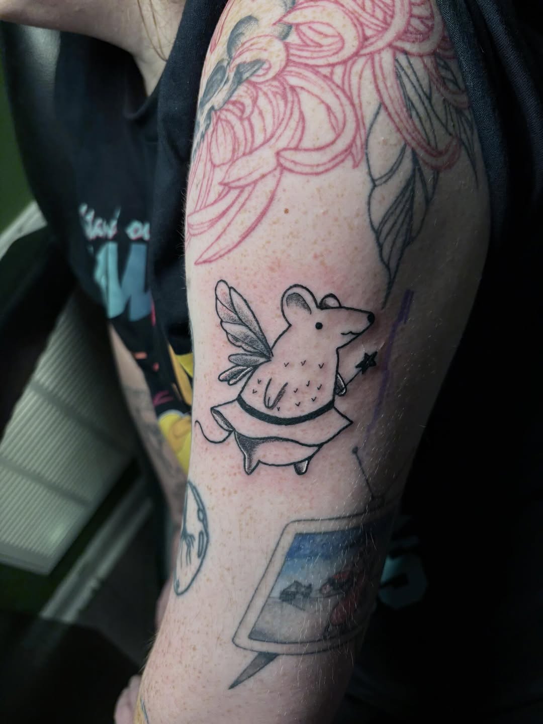 Fairy mouse with magic wand fine line tattoo on the forearm by Angel Arceo