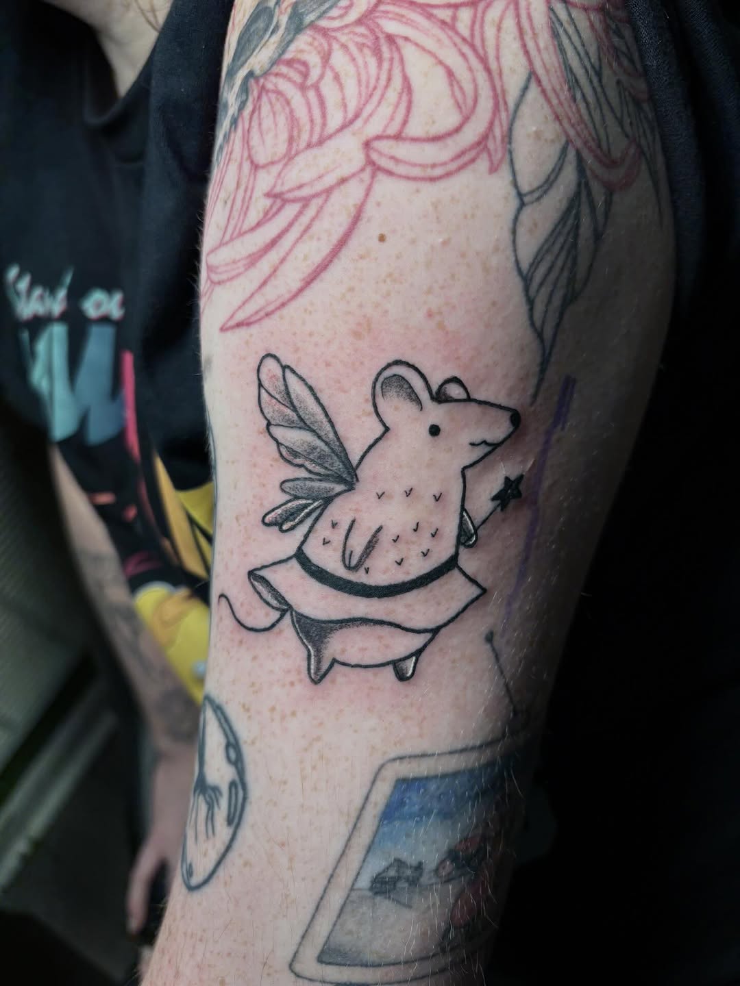 Fairy mouse with star wand fine line tattoo on the forearm by Angel Arceo