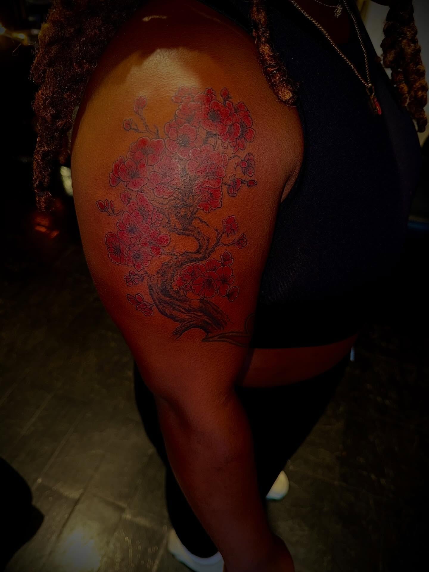 Cherry blossom tree dotwork tattoo on the thigh by Clifford Jordan