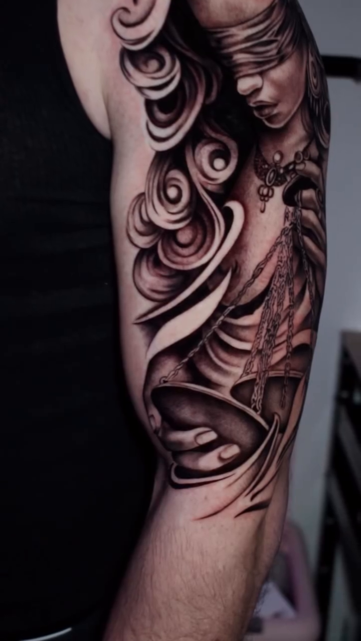 Tattoo by @taboo.tattoos_ — realism, black_and_grey