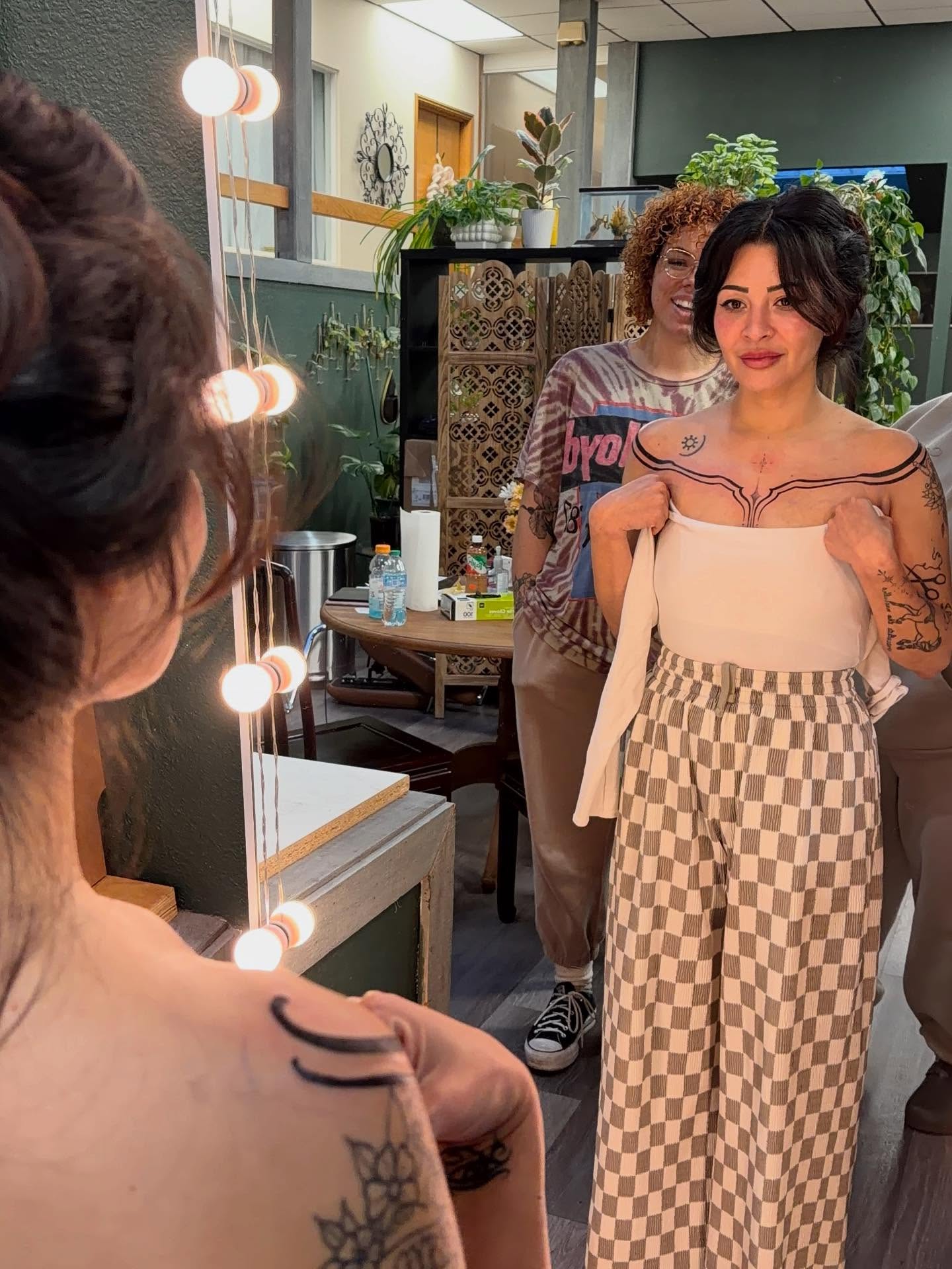 Geometric geometric tattoo on the chest by Rachel Foster