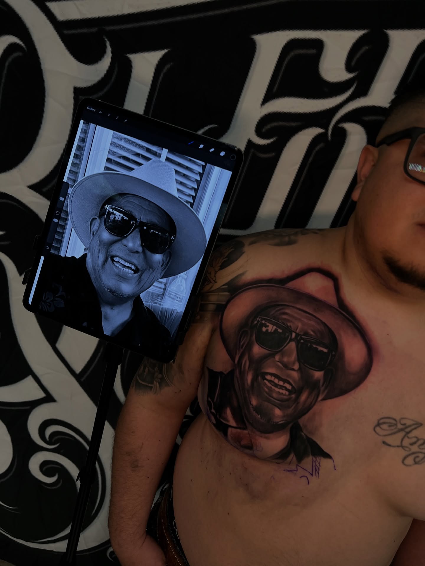 Portrait realism tattoo on the chest by Daniel Michael Perez
