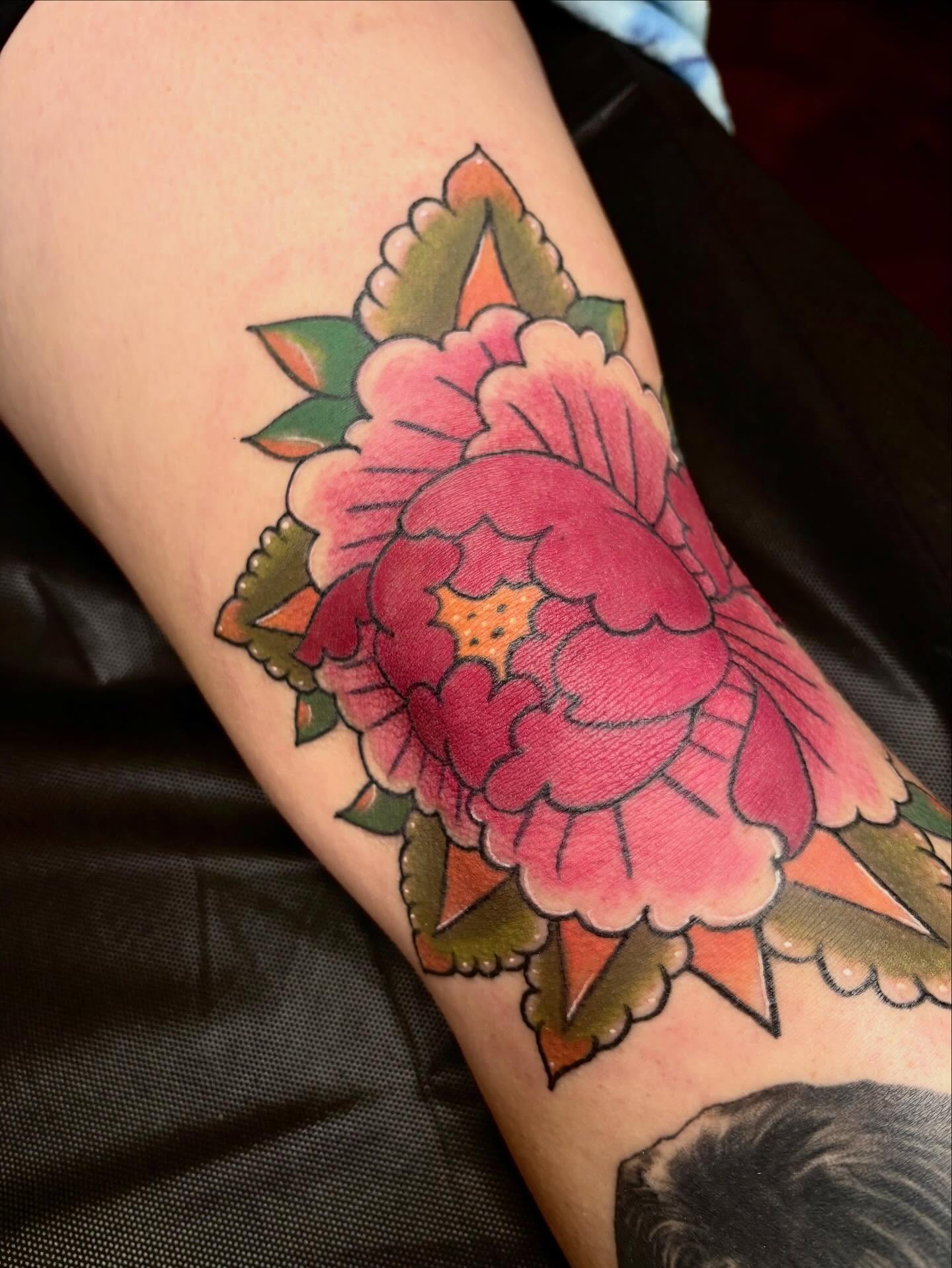 Peony flower American traditional tattoo on the forearm by Jelly
