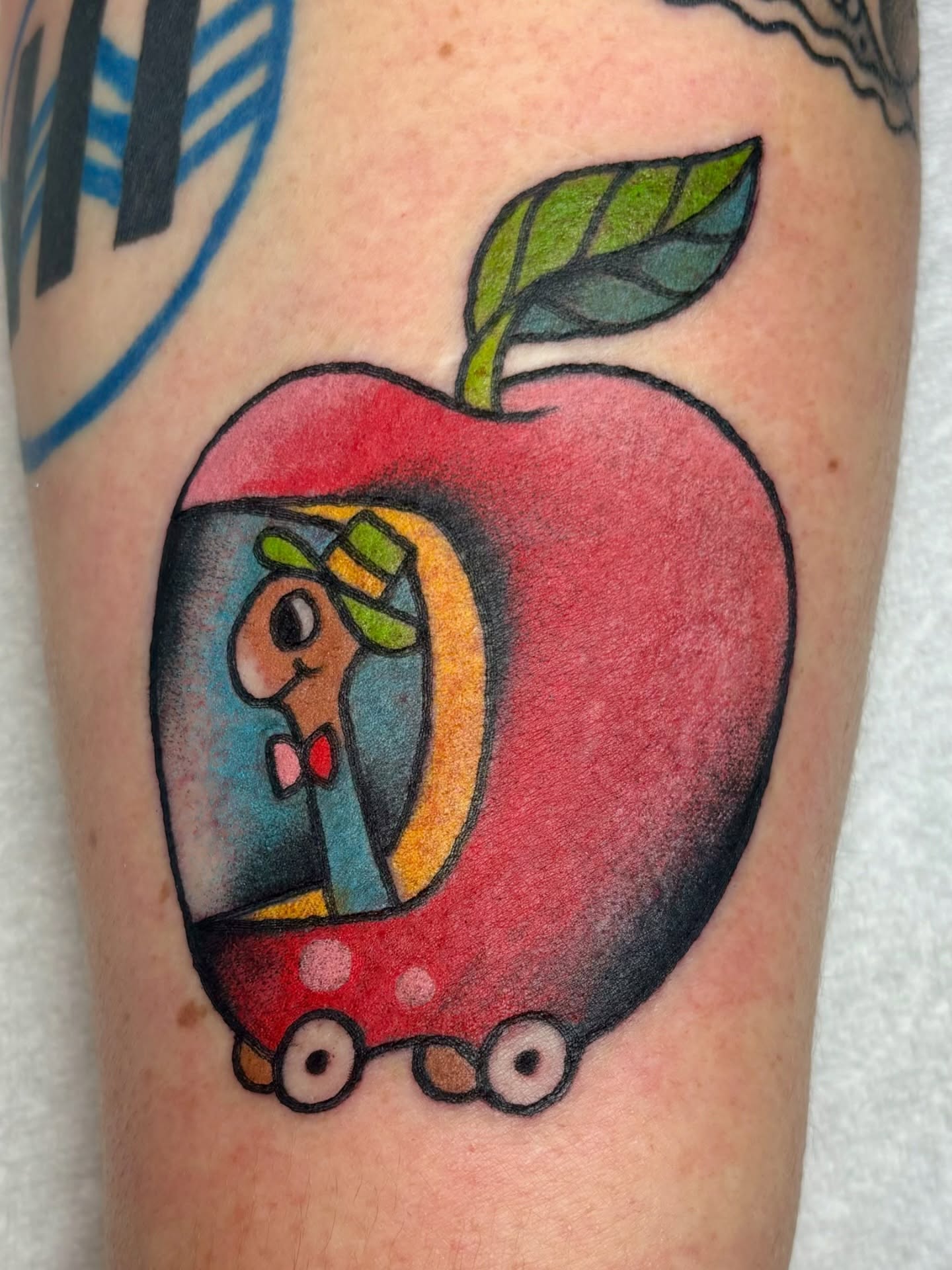 Apple with turtle American traditional tattoo on the forearm by edith🌷, Murfreesboro, Tennessee