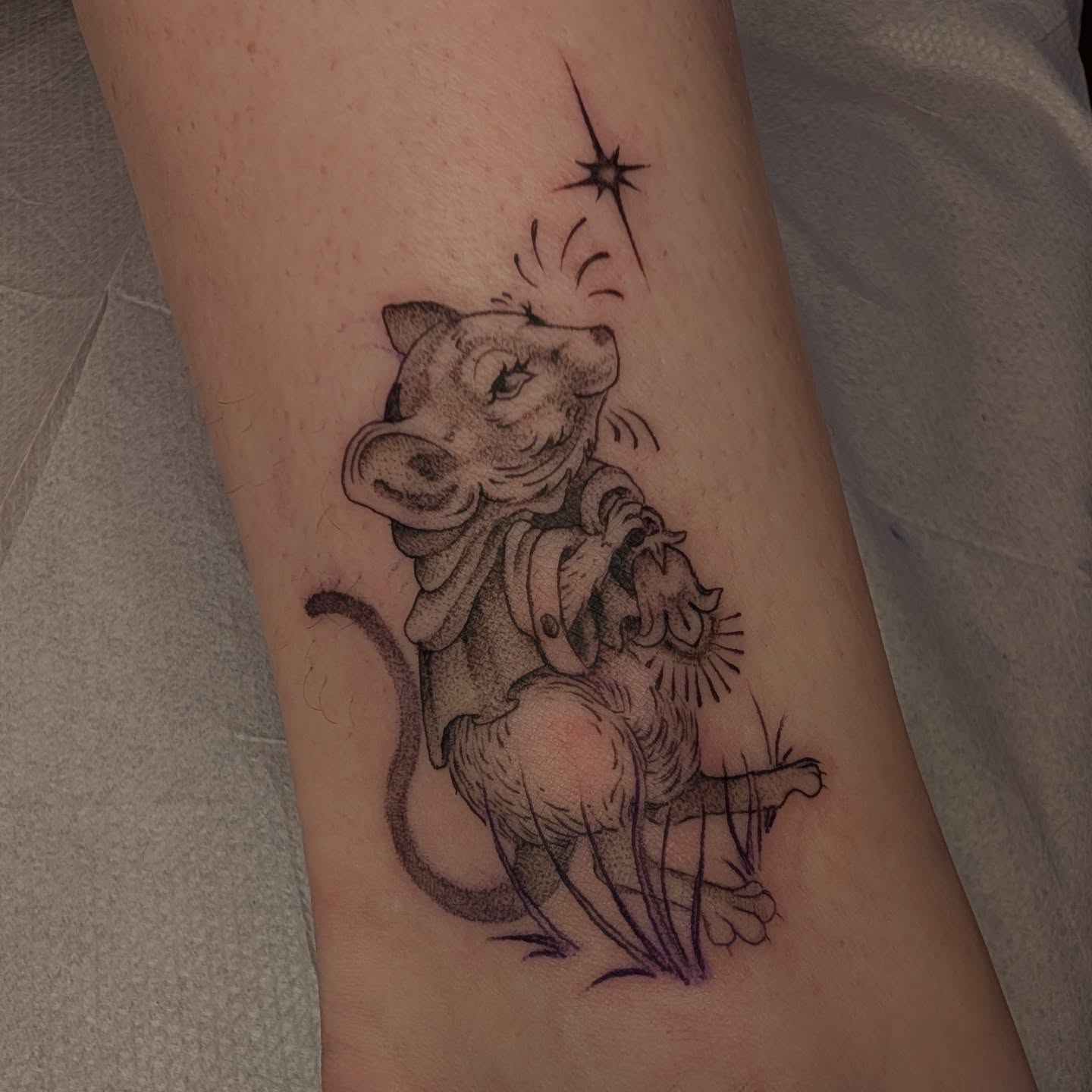 Mouse and lion dotwork tattoo on the forearm by Jeanine, Providence, Rhode Island
