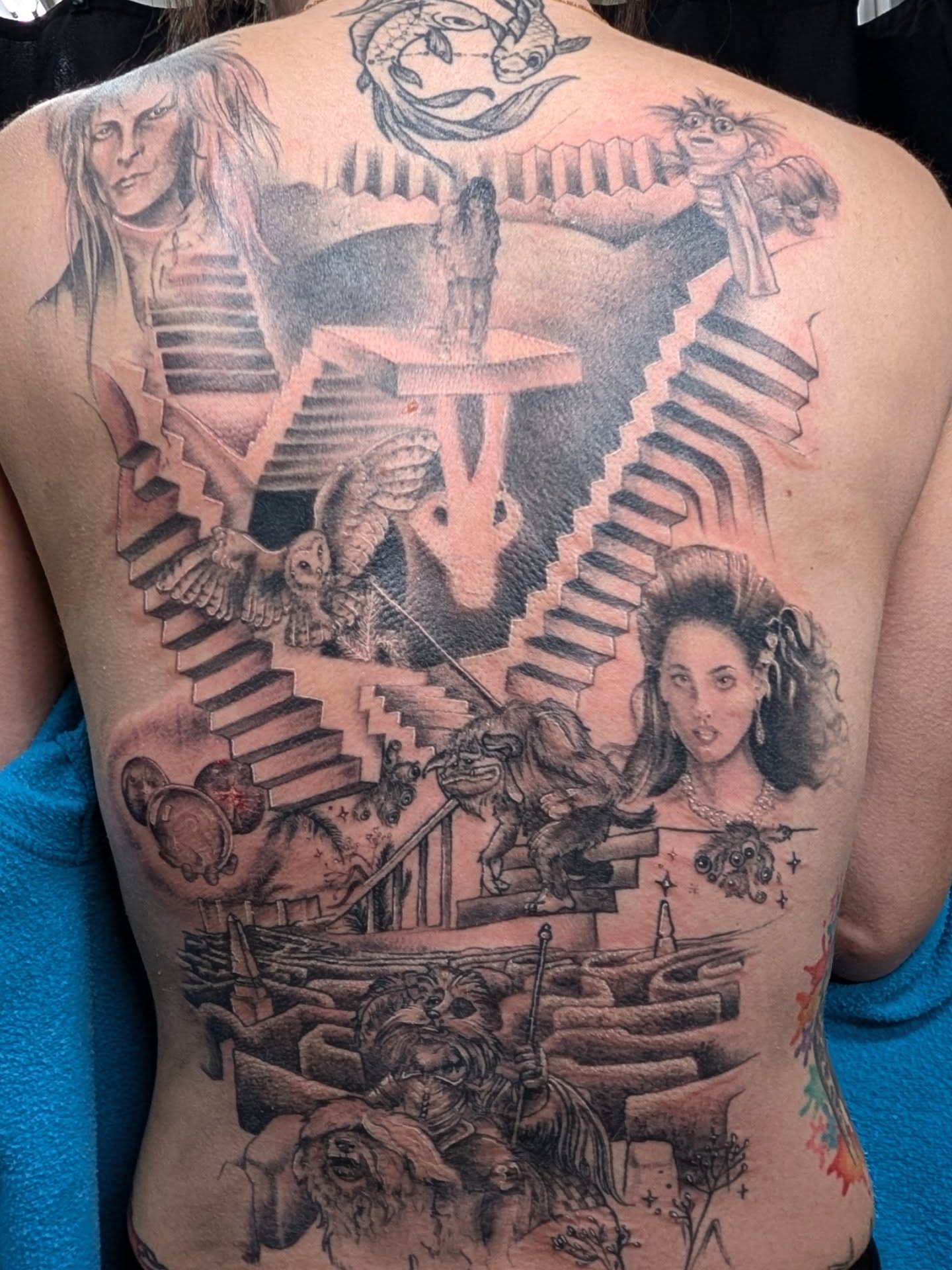 Labyrinth scene realism tattoo on the back by Katherine