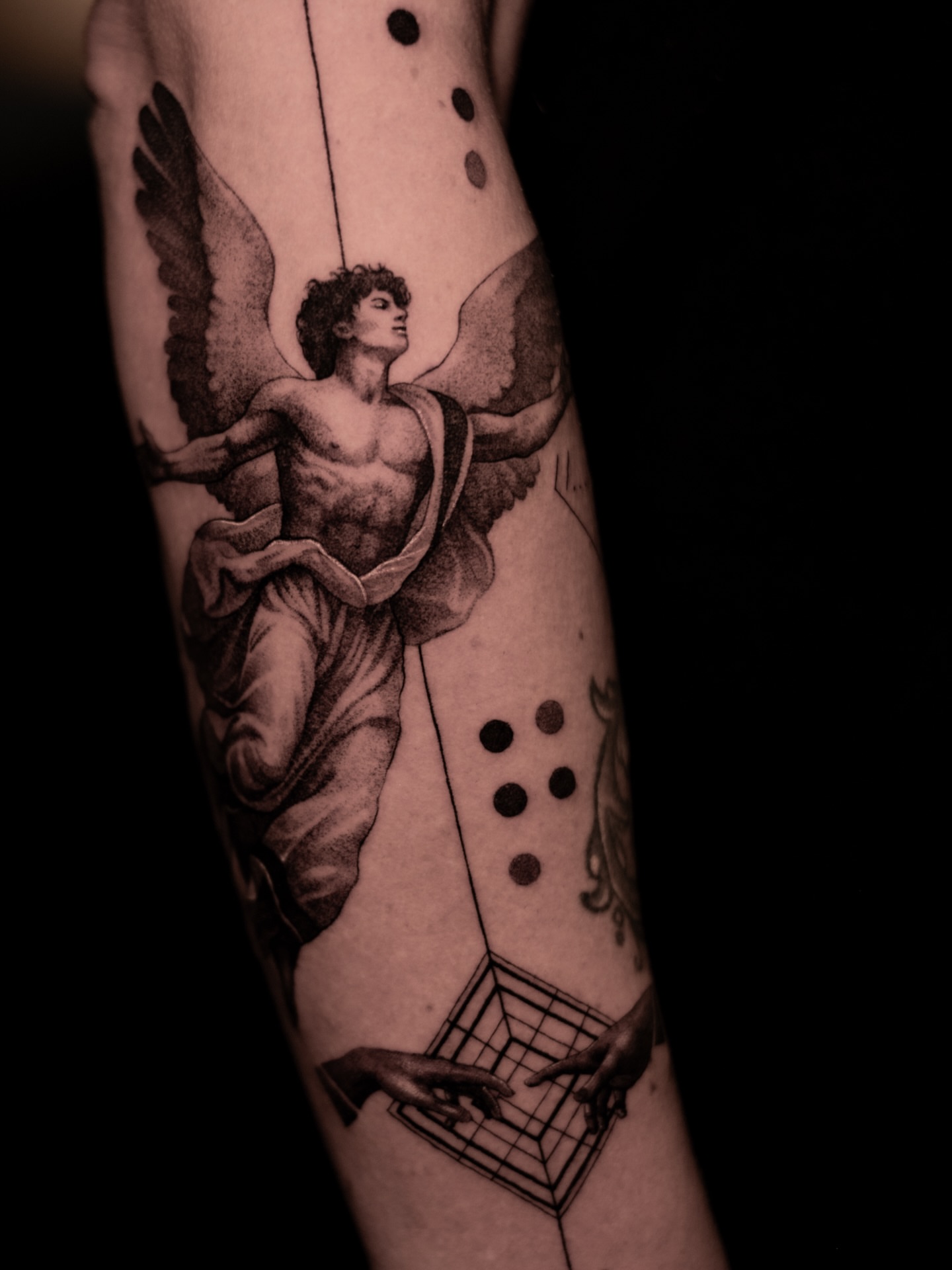 Angel with wings dotwork tattoo on the forearm by Mark D, Los Angeles, California