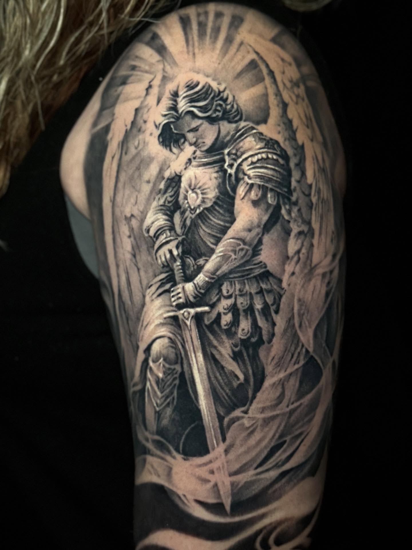 Angelic warrior realism tattoo on the shoulder by Gabe Jensen