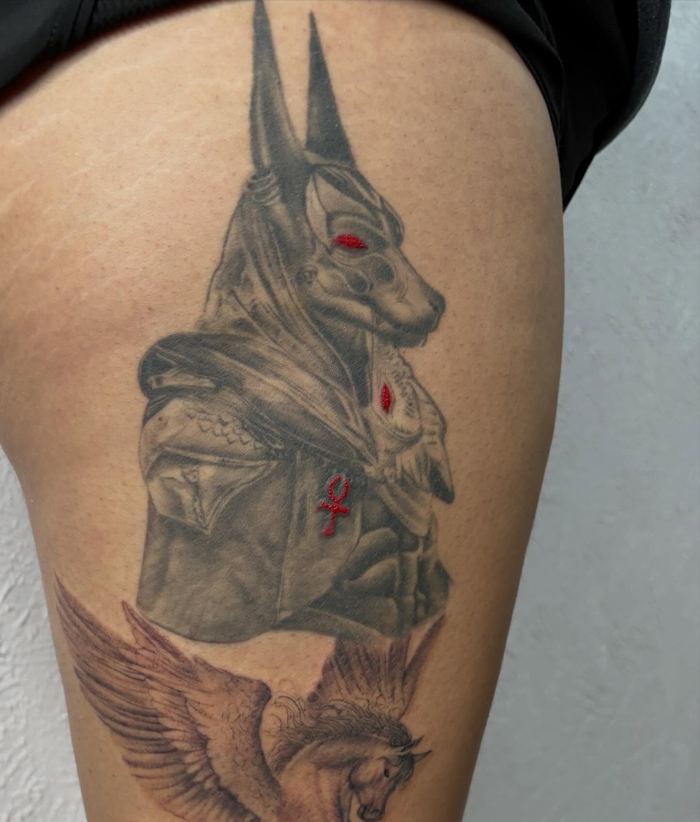 Anubis statue realism tattoo on the thigh by Jackie π€
