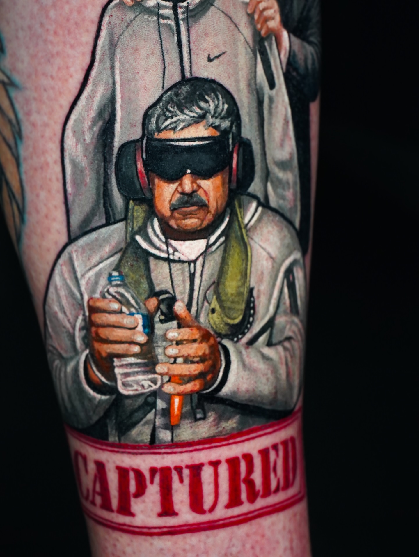Man with blindfold realism tattoo on the forearm by Luis Gil