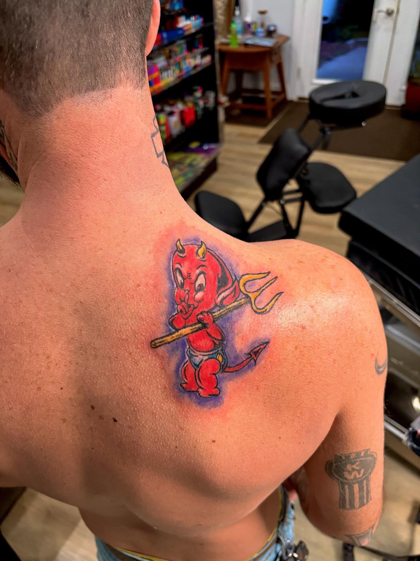 Tattoo by @pandamonium_tattoos — illustrative