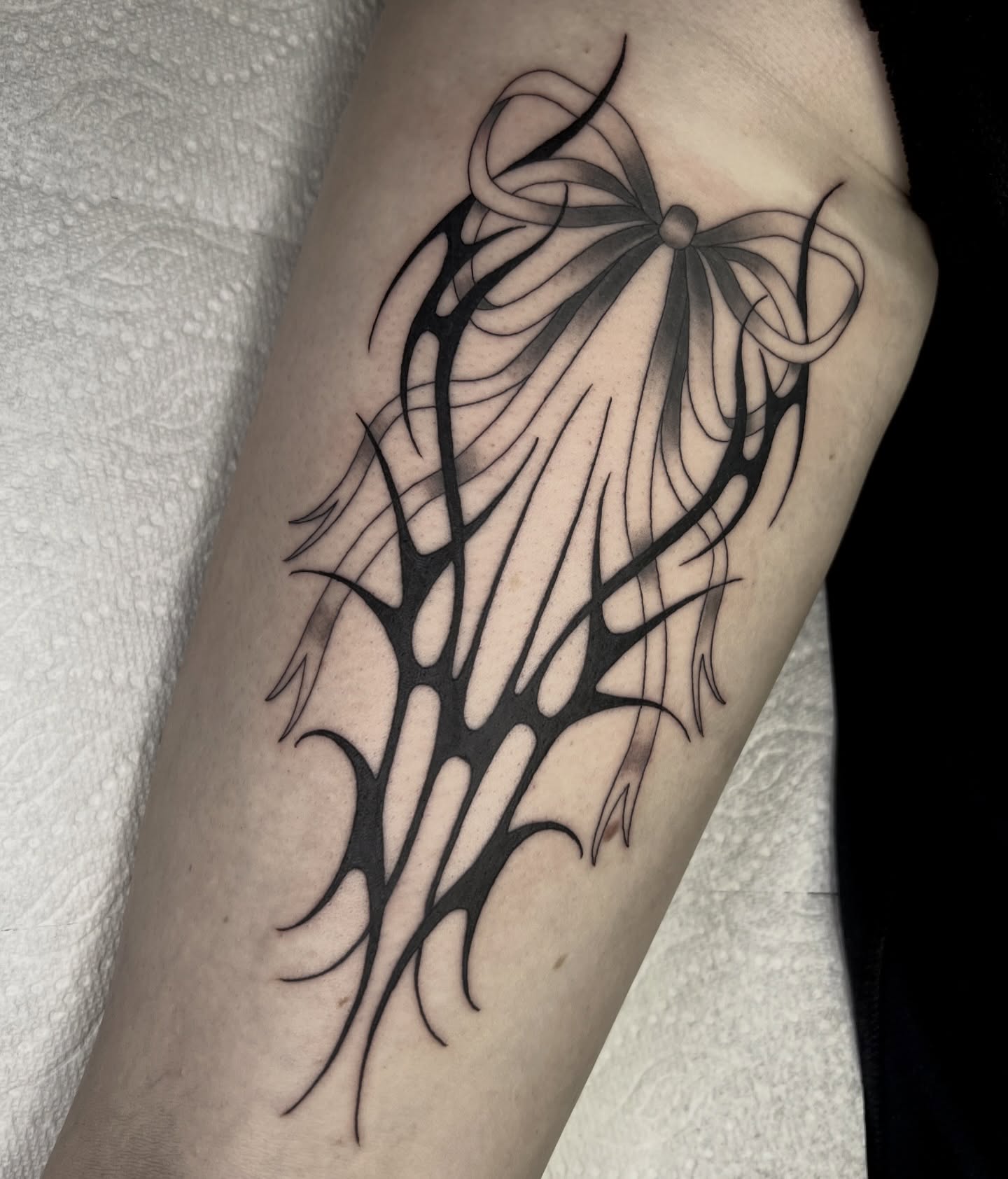 Bow tribal tattoo on the forearm by 𝔓𝔢𝔞𝔠𝔥𝔶 𝔄𝔫𝔰𝔩𝔢𝔶