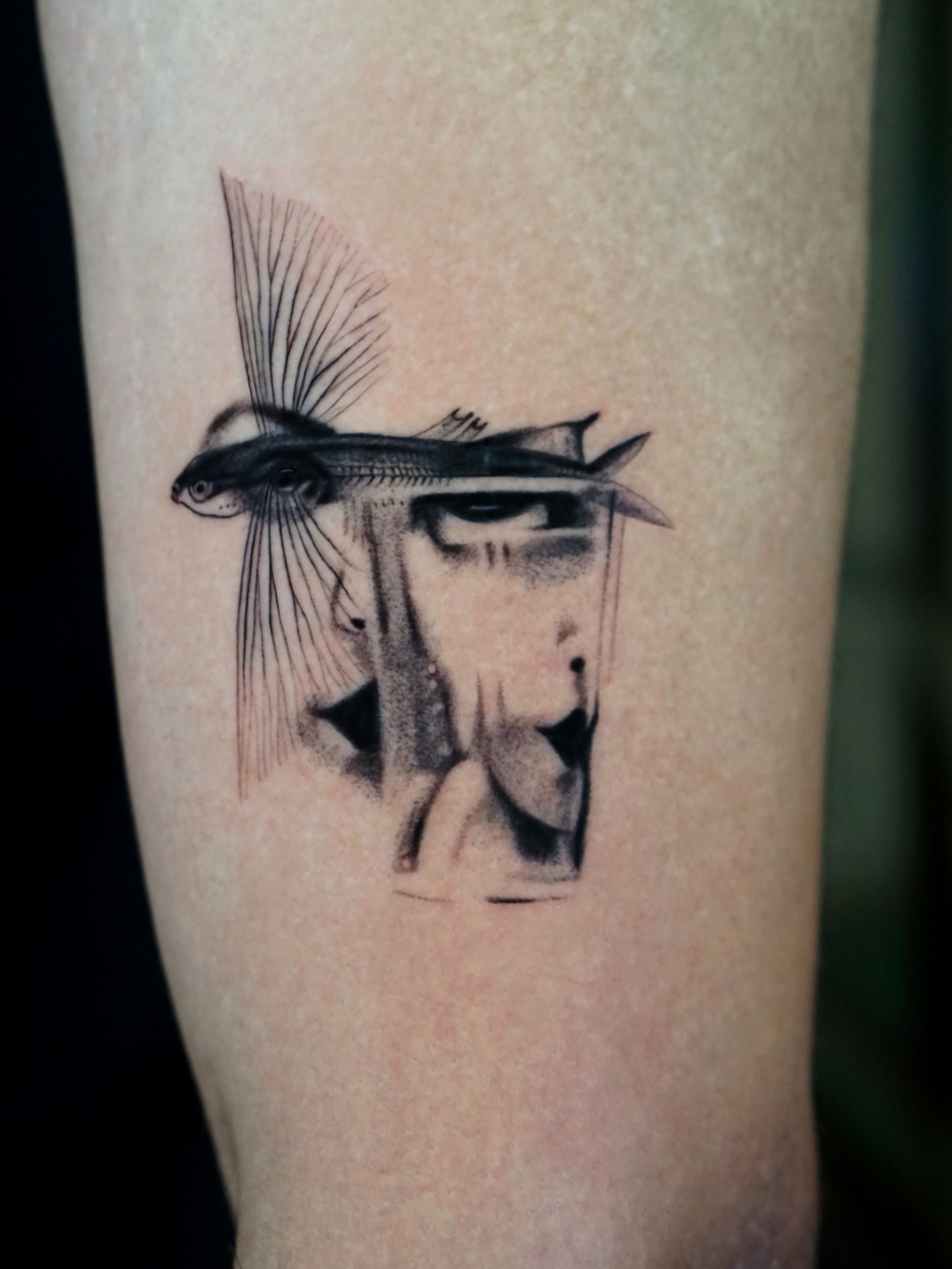 Abstract fish realism tattoo on the forearm by Metin Karaatli