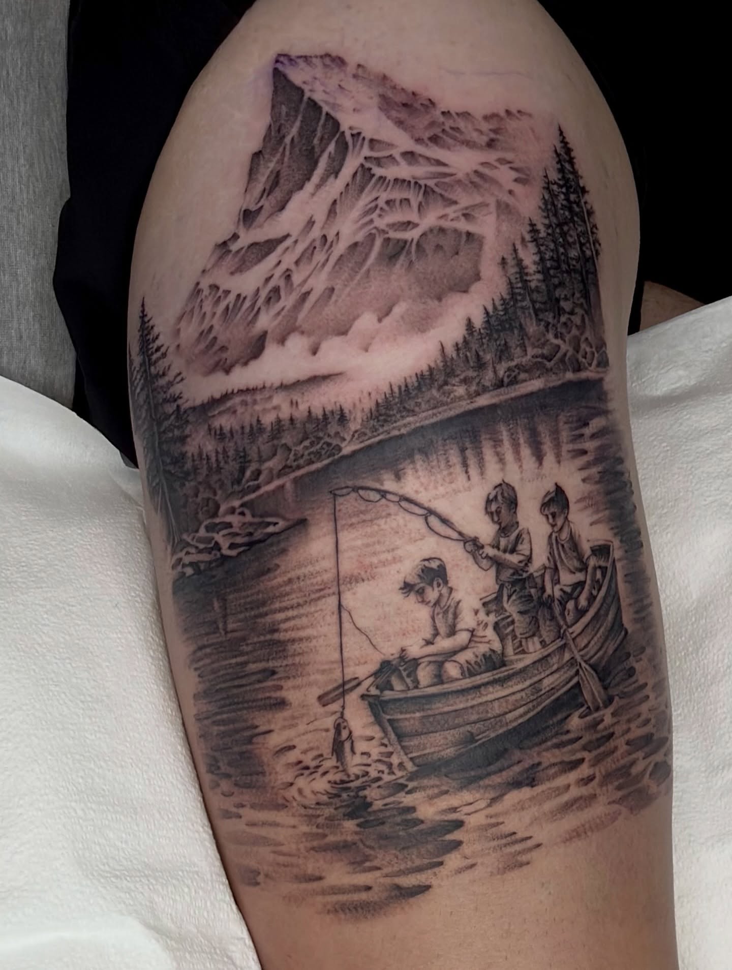 Fishing scene realism tattoo on the thigh by Joe Cruz