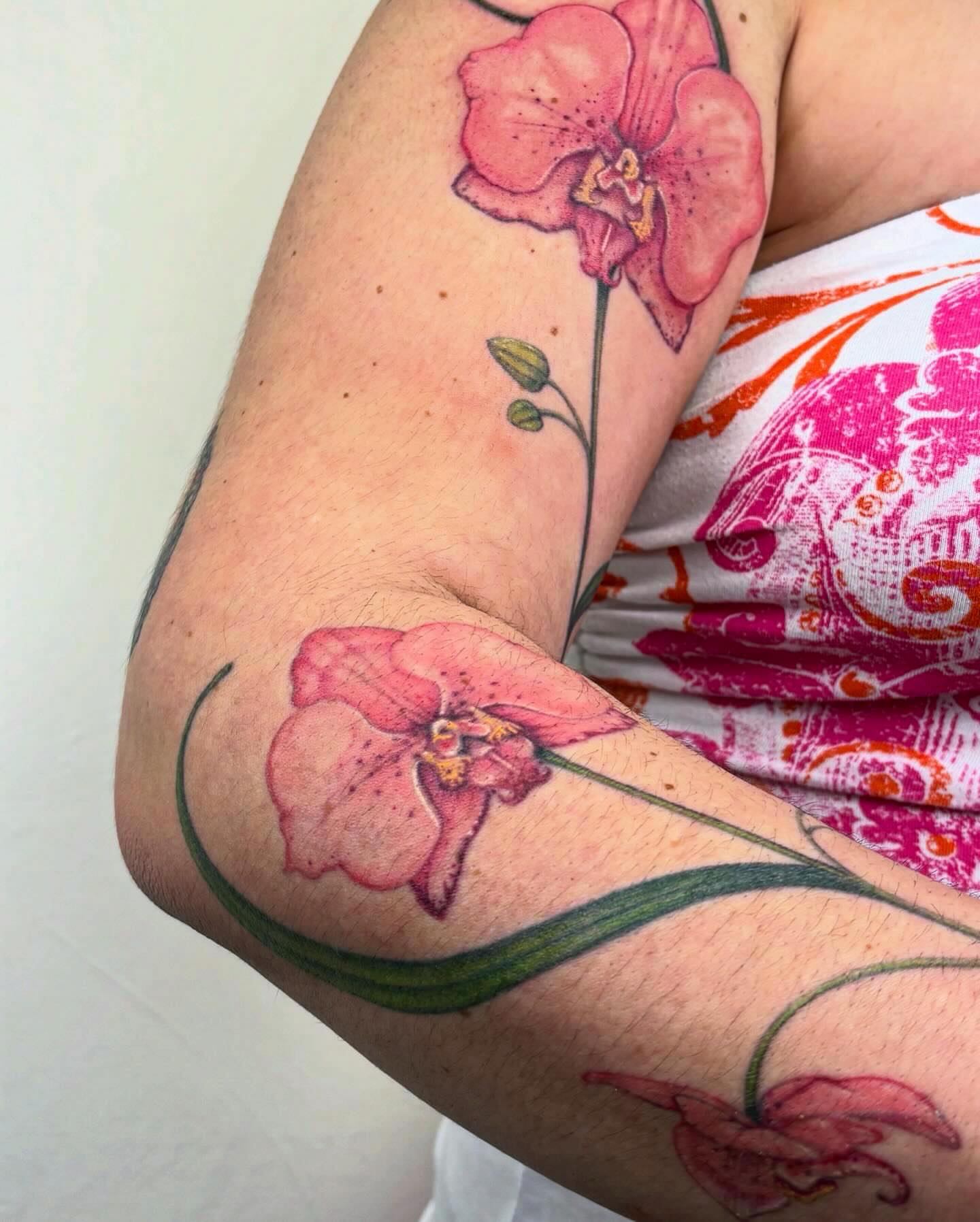 Orchid realism tattoo on the forearm by β±βΏβ° π π π° π πΎ β±βΏβ°