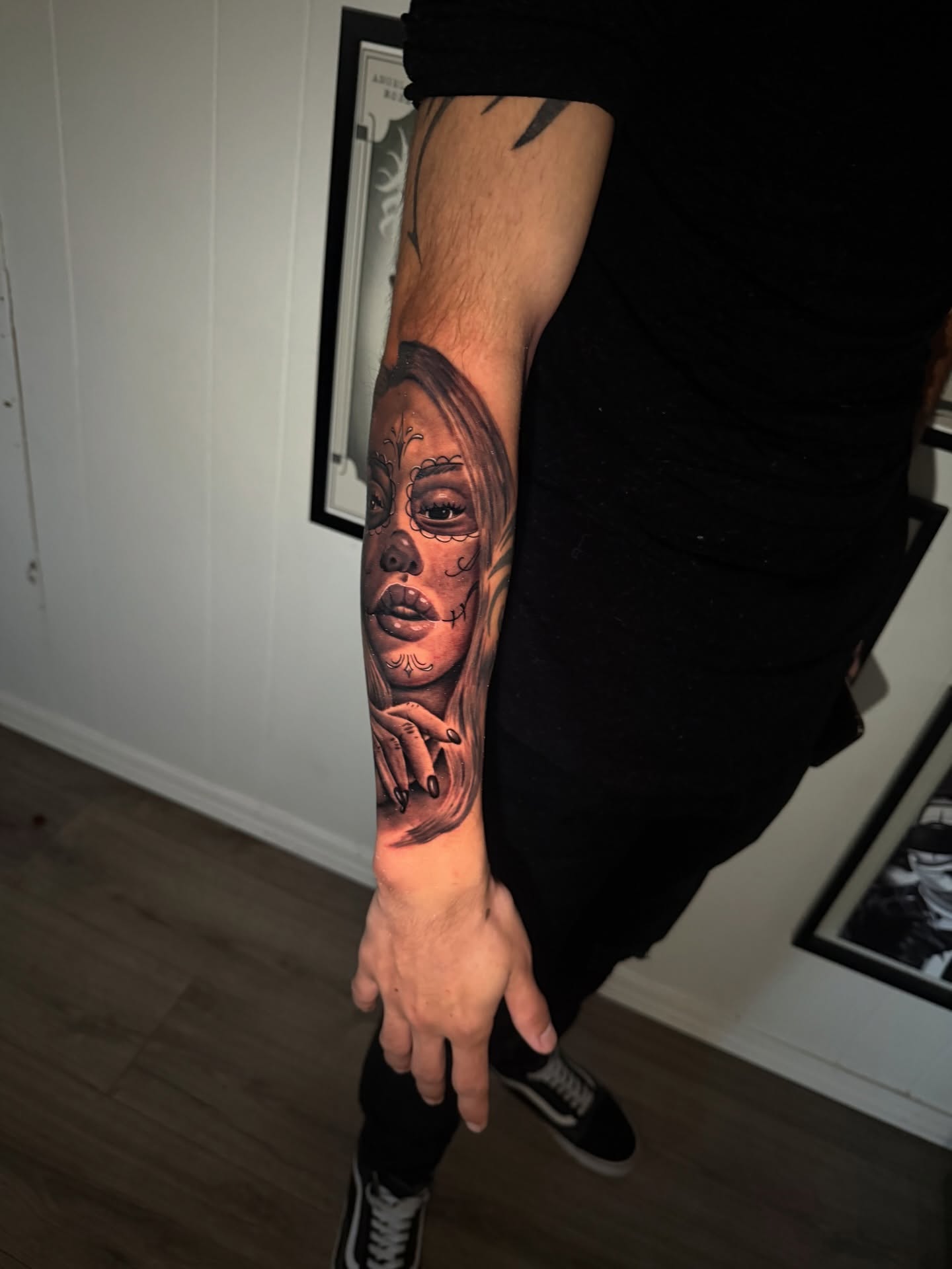 Sugar skull realism tattoo on the forearm by Danny Vazquez