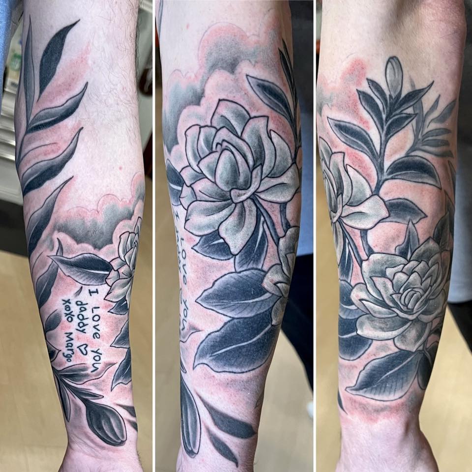 Succulent and leaves black and grey tattoo on the forearm by Jessica Kloos