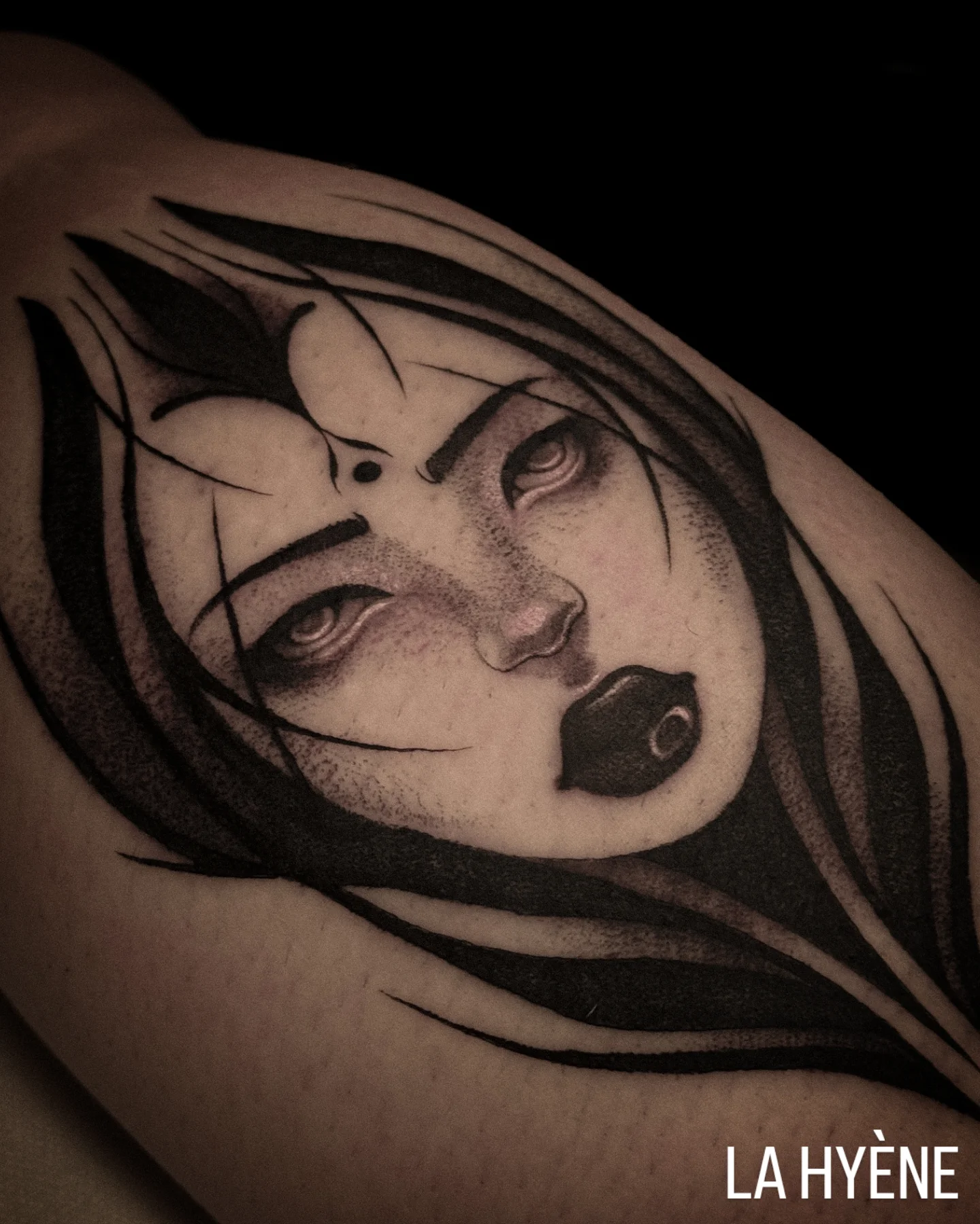 Anime character dotwork tattoo on the shoulder by La Hyene