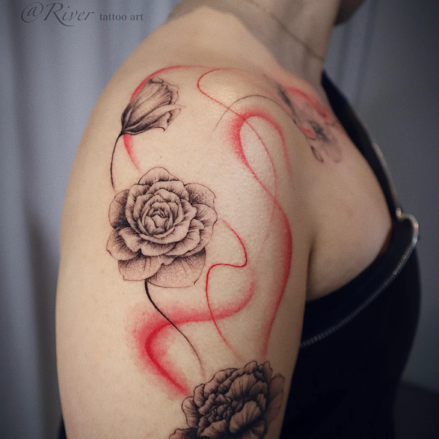 Rose black and grey tattoo on the shoulder by River