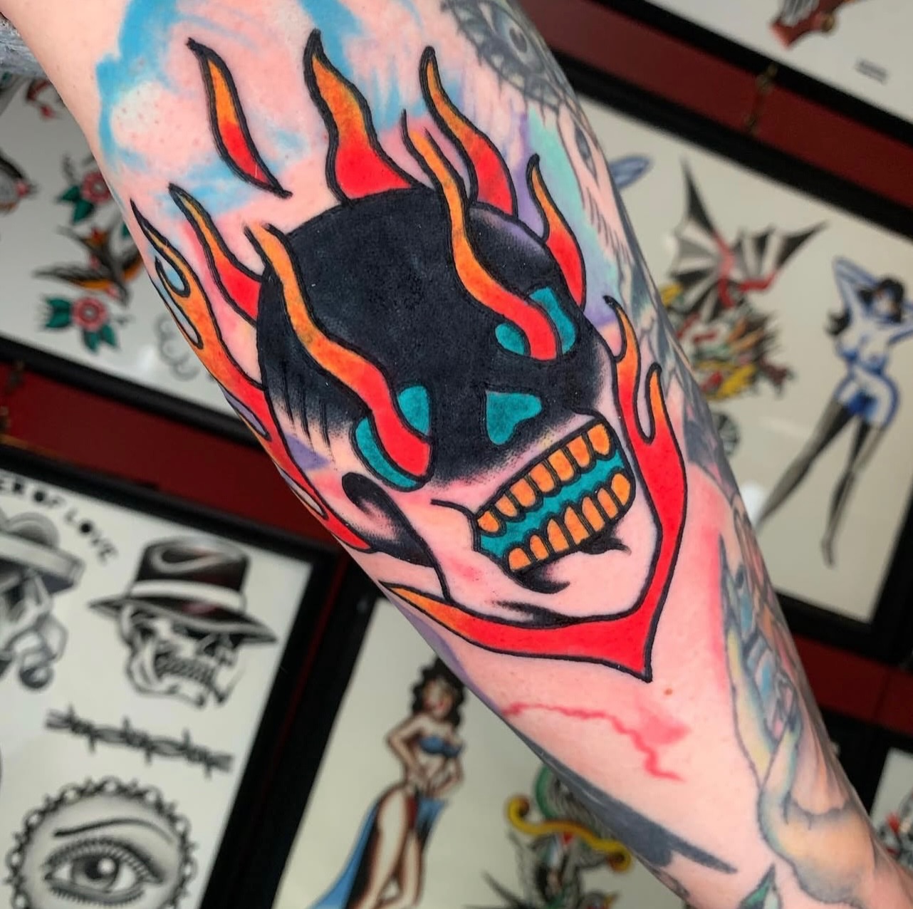 Flaming skull American traditional tattoo on the forearm by Like A Horse Corral