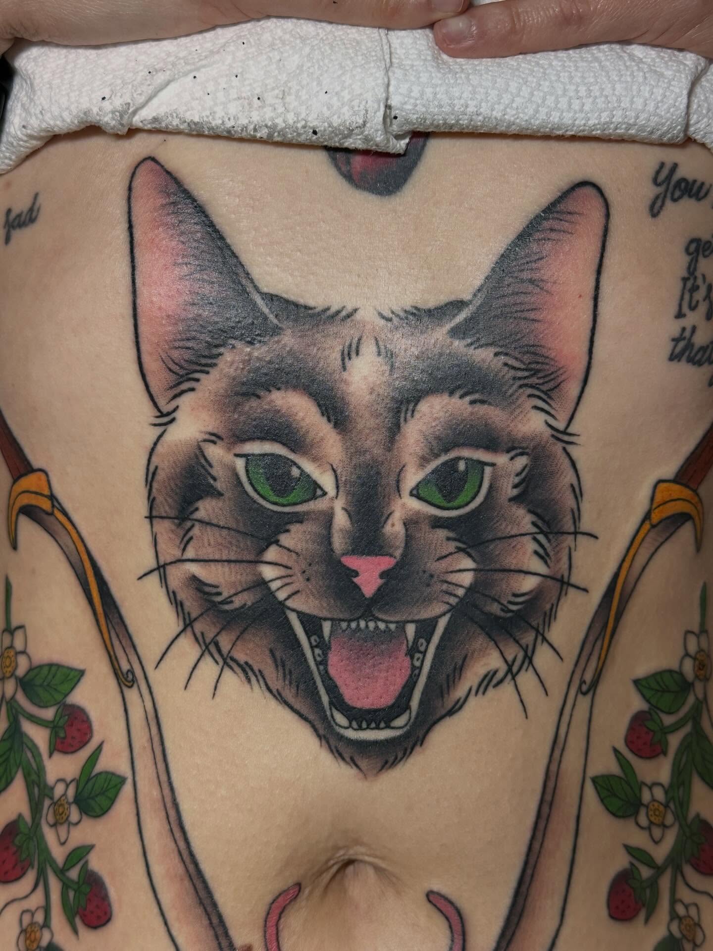 Cat realism tattoo on the thigh by Tattoo artist