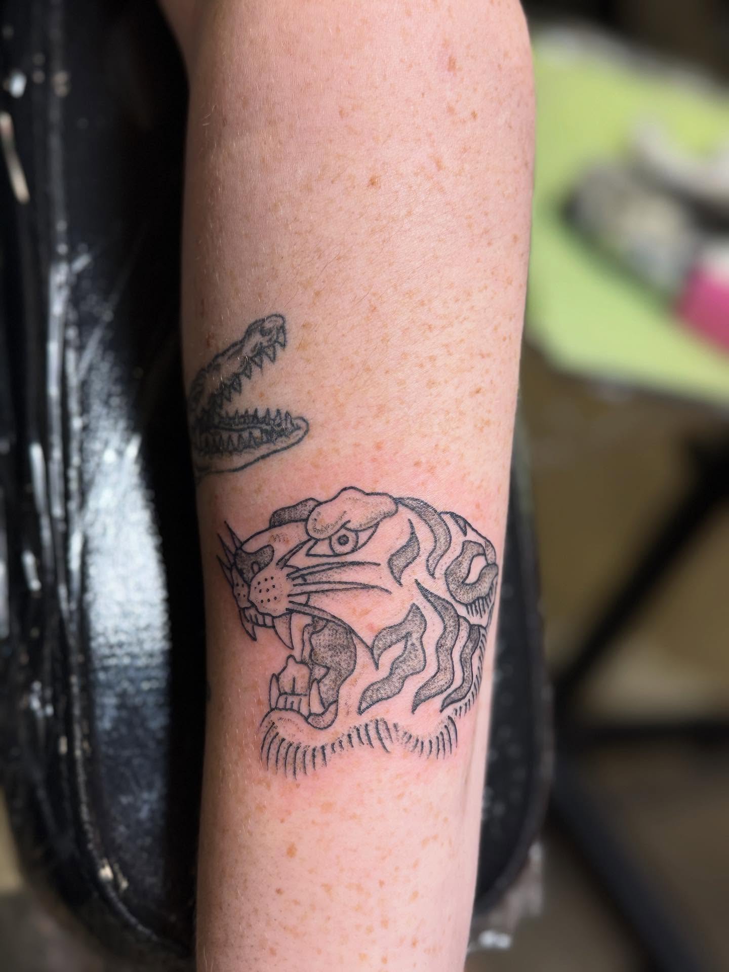 Tiger black and grey tattoo on the forearm by goose 🪿
