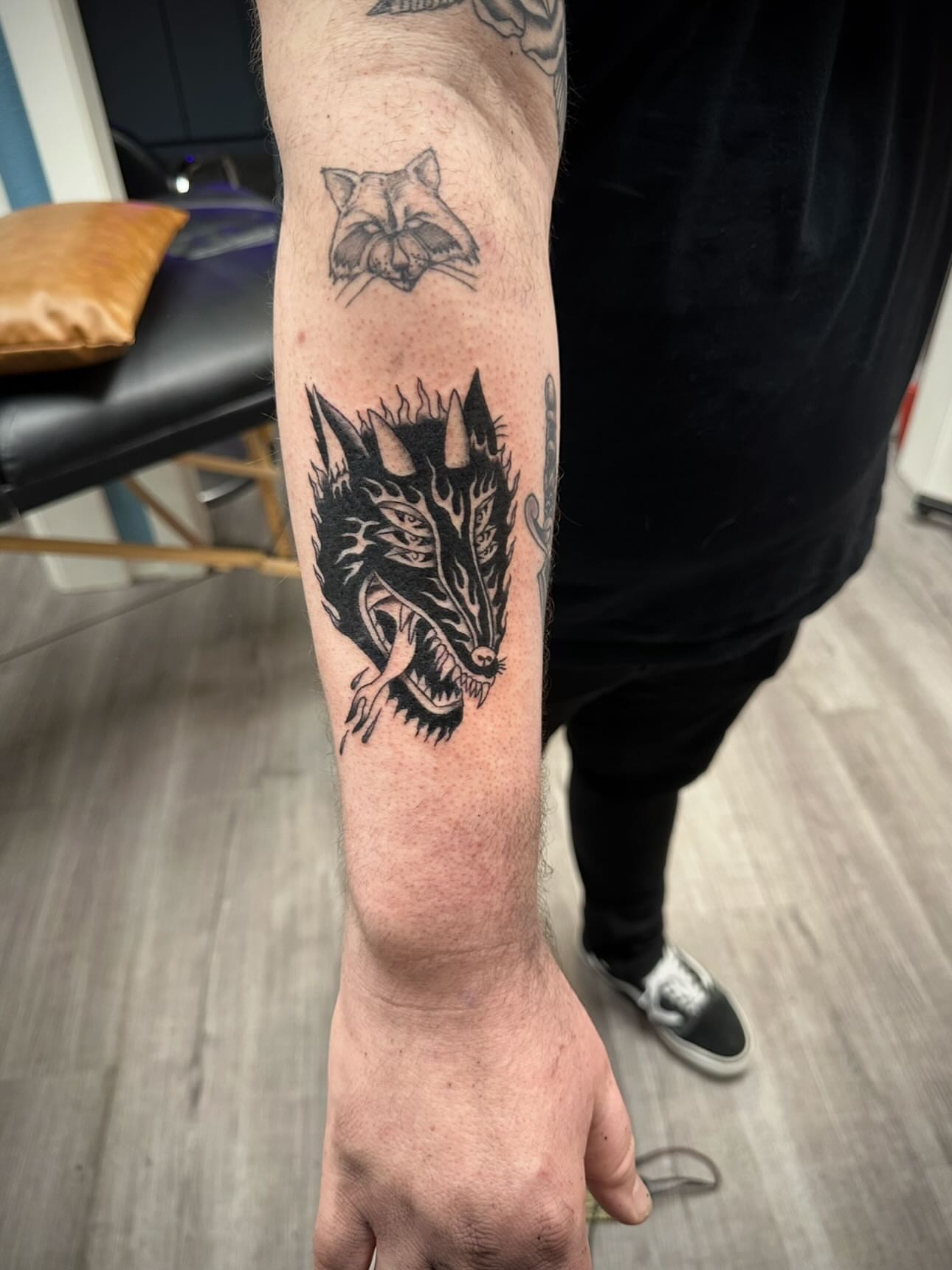 Wolf black and grey tattoo on the forearm by rory