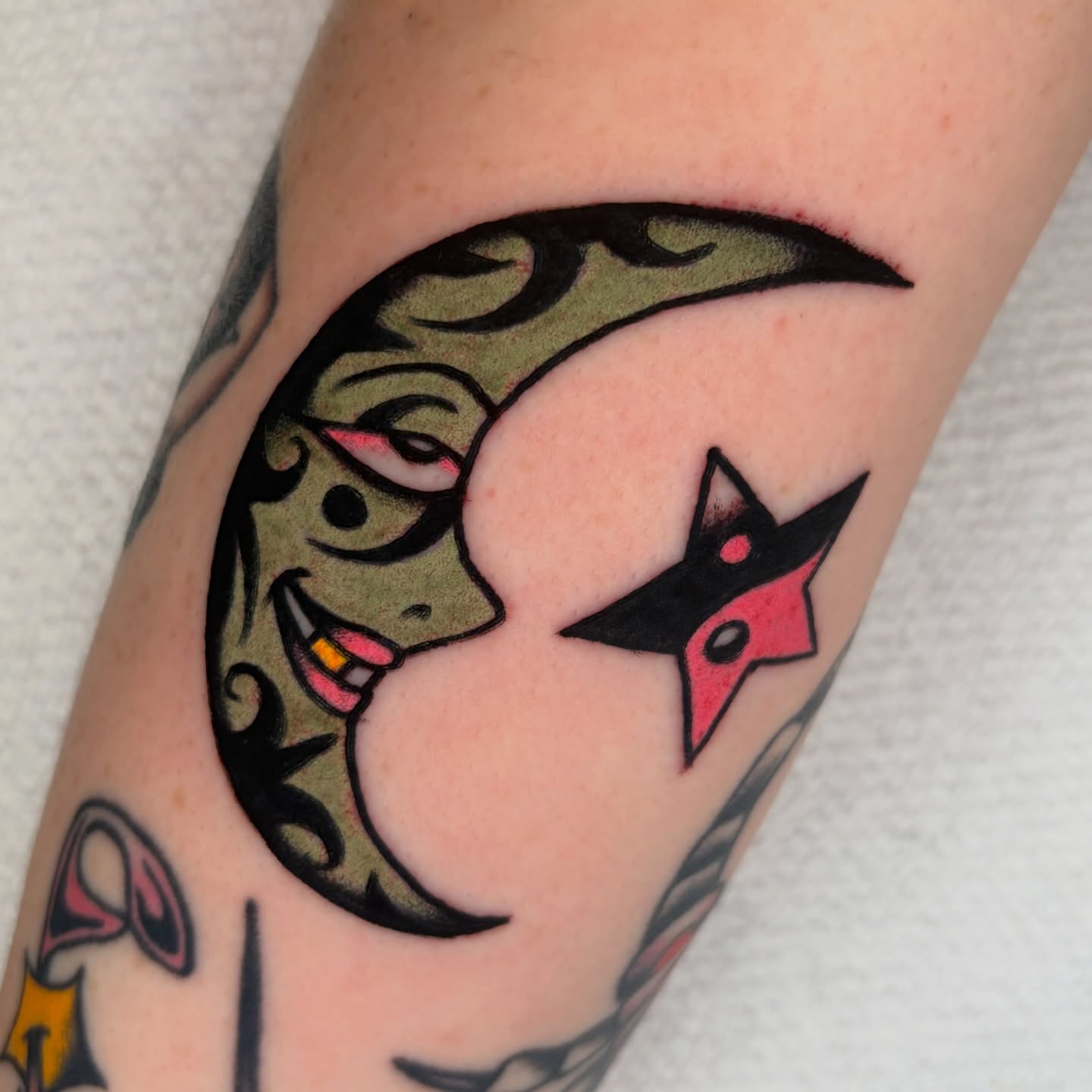 Moon and fox American traditional tattoo on the forearm by rachael