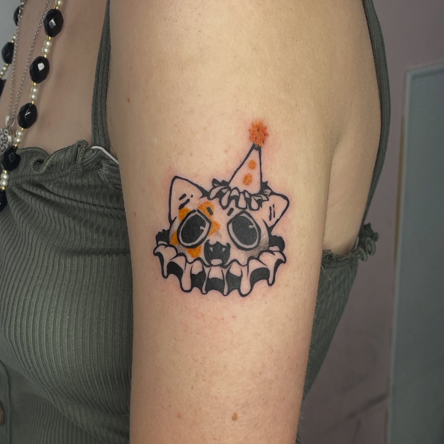 Cat skull with party hat dotwork tattoo on the forearm by Mia 	\(★ω★)