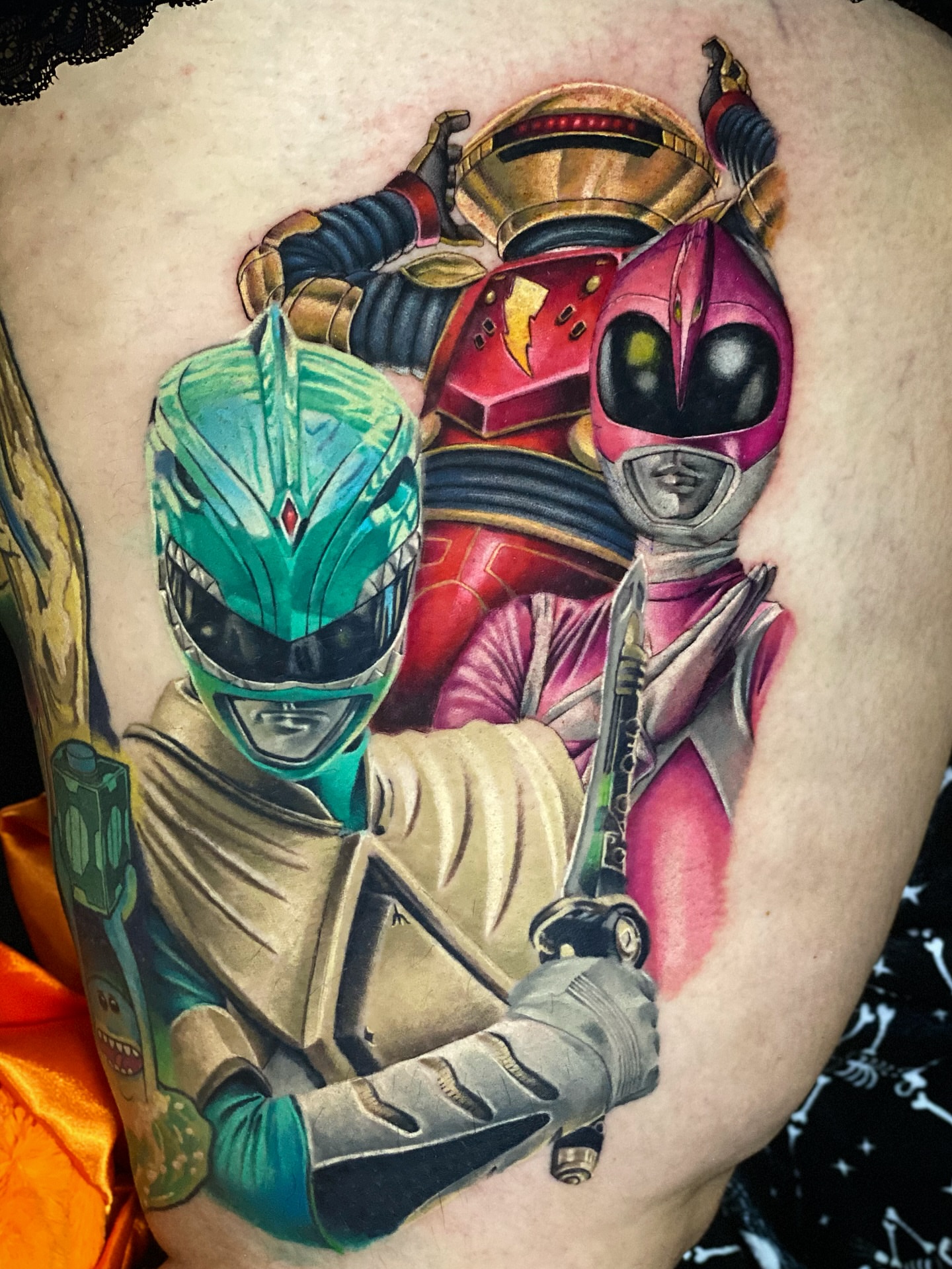 Power rangers realism tattoo on the thigh by Seth Mullin, Hemet, California