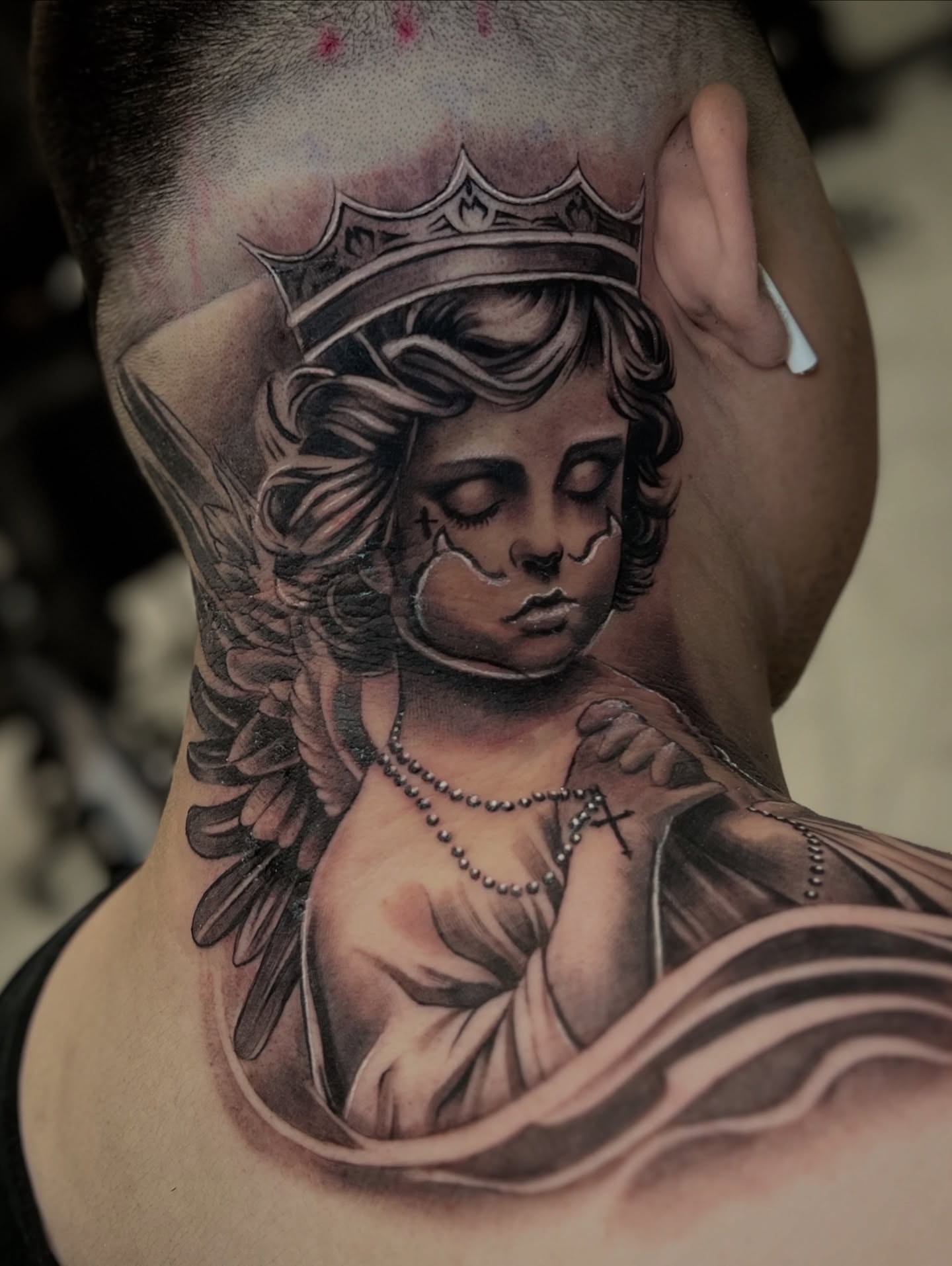 Angels American traditional tattoo on the shoulder by Flames, Cerritos, California
