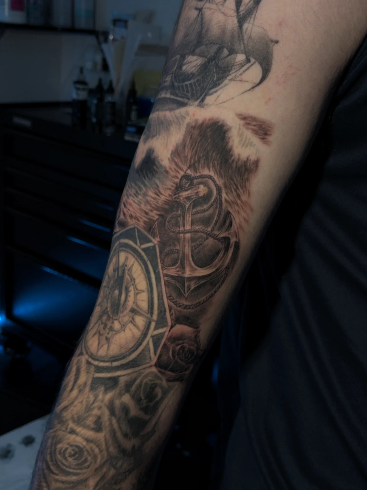 Ship, anchor, compass, snake realism tattoo on the forearm by Bek Artz