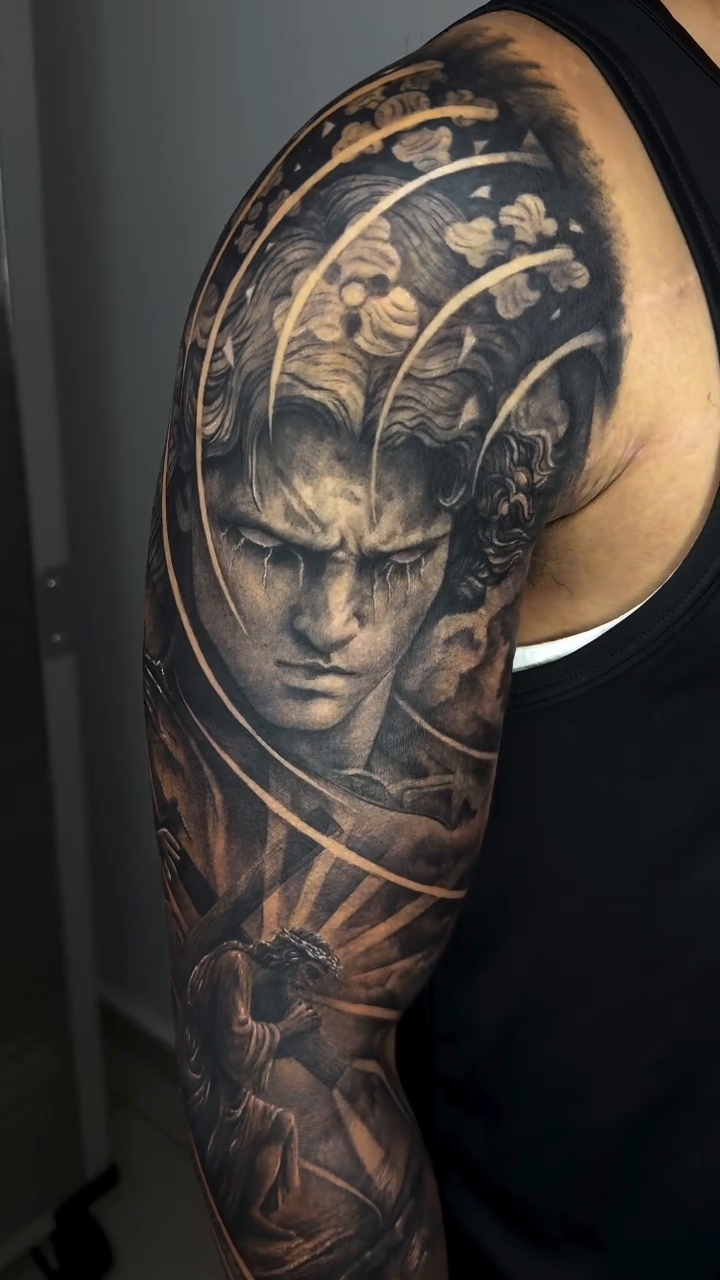 Tattoo by @elmertattoo1 — realism, black_and_grey