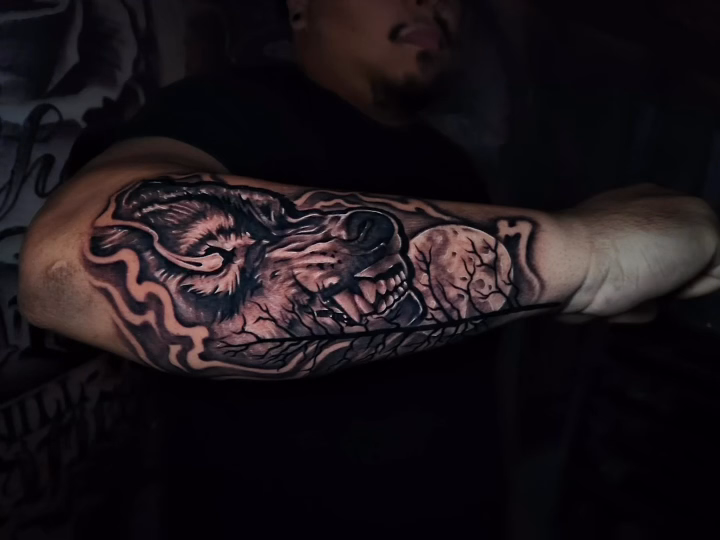 Wolf and cubs realism tattoo by professional tattoo artist