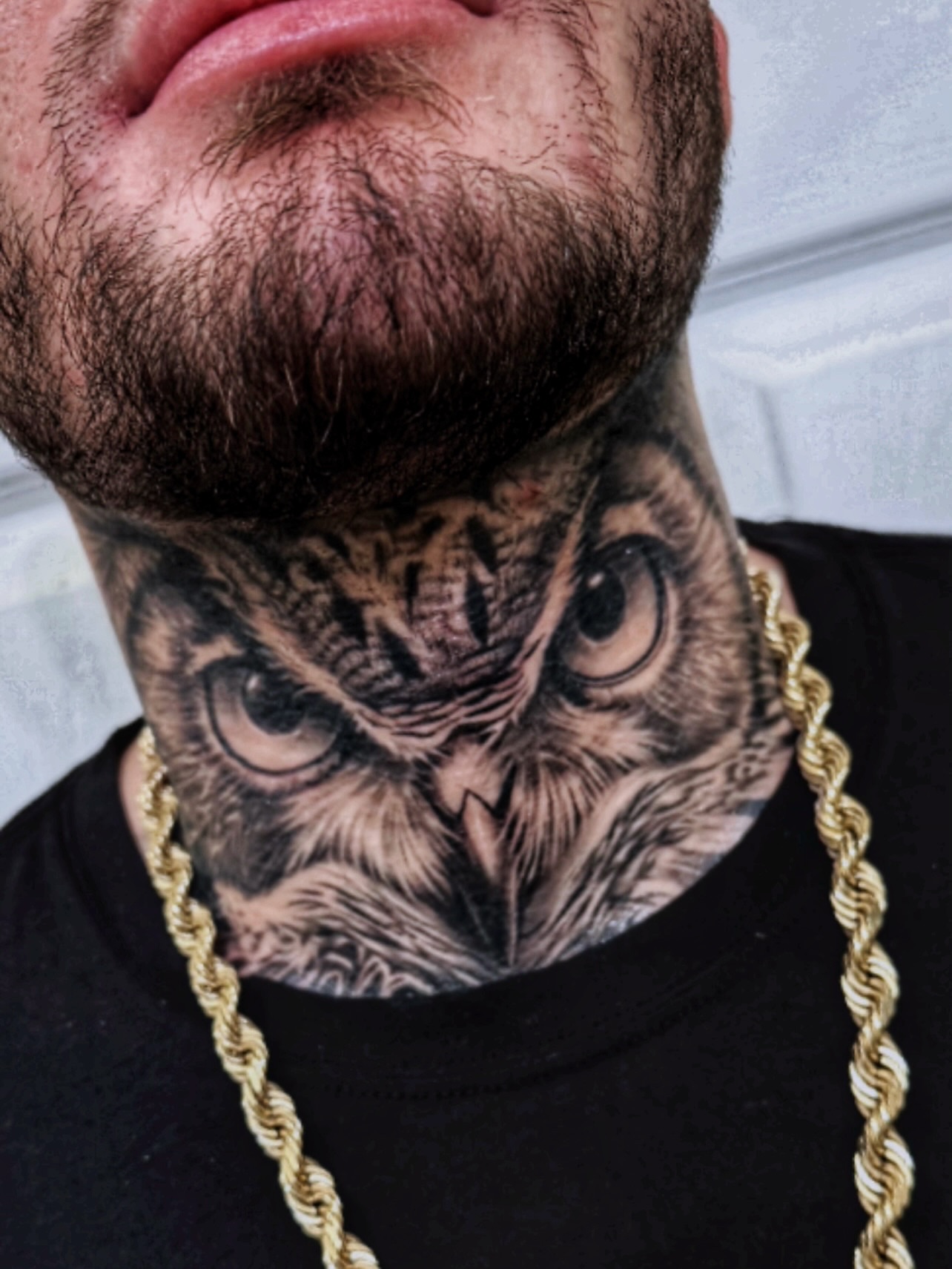 Owl realism tattoo on the neck by Lynn Hoang, Honolulu, Hawaii