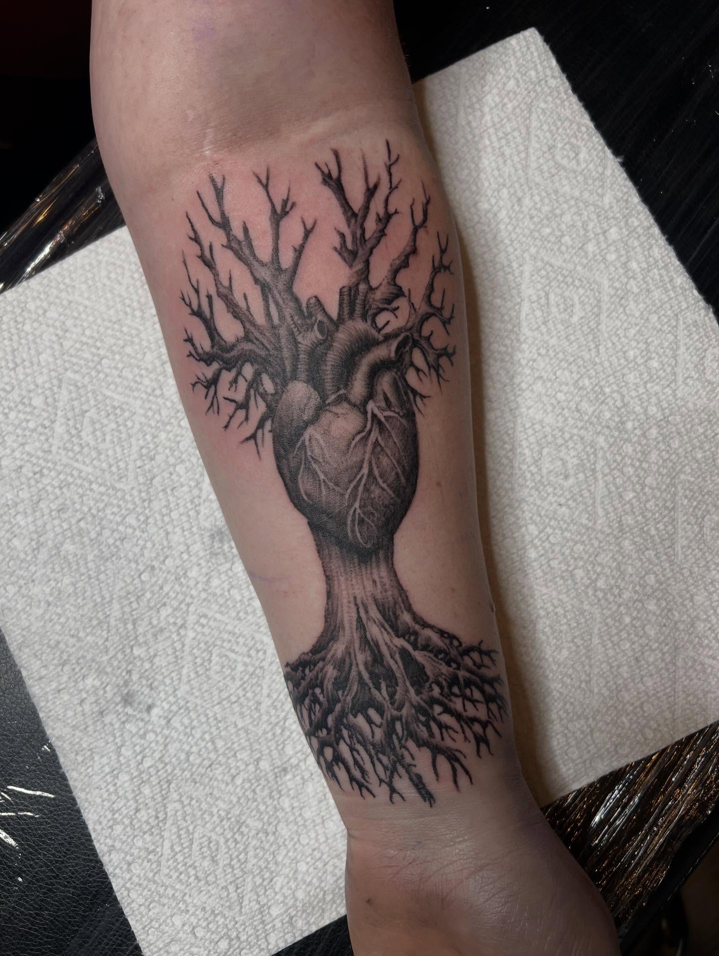 Heart tree realism tattoo on the forearm by Lord Daniel Serna