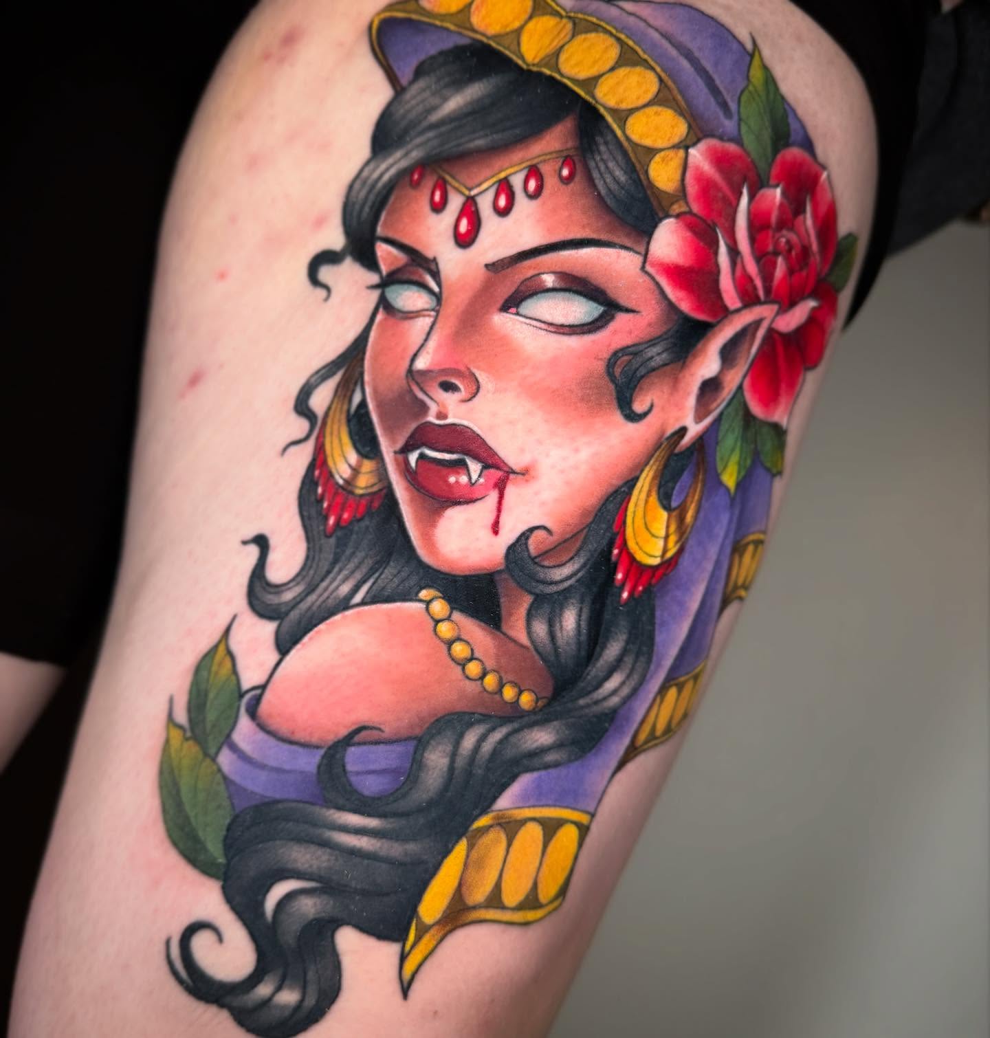 Female vampire American traditional tattoo on the thigh by Skye Kimball