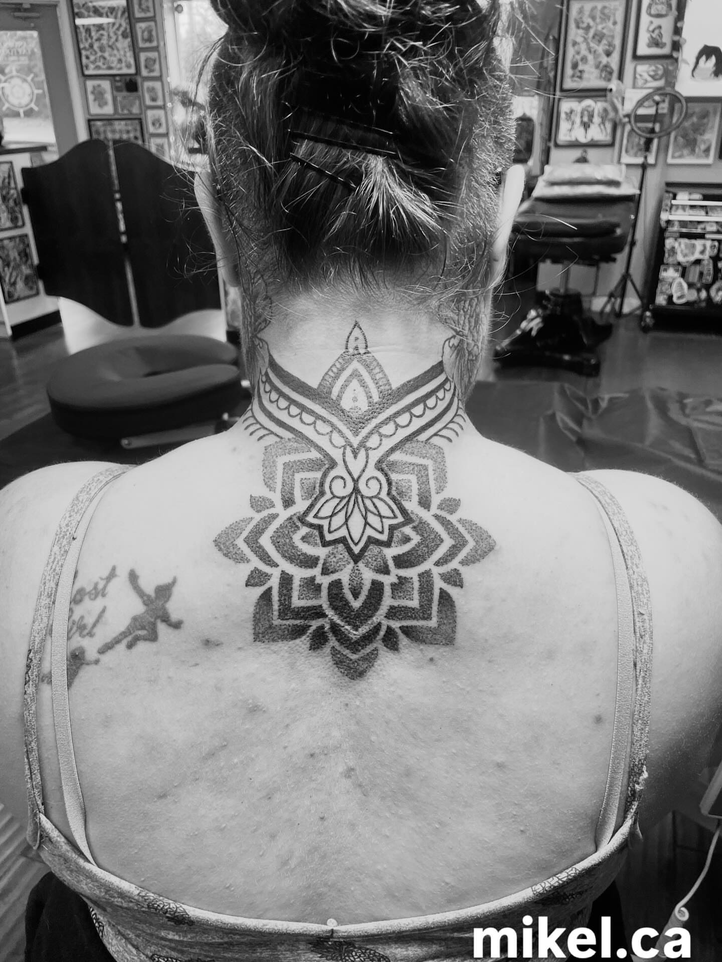 Mandala geometric tattoo on the neck by mikel_tattoosangha