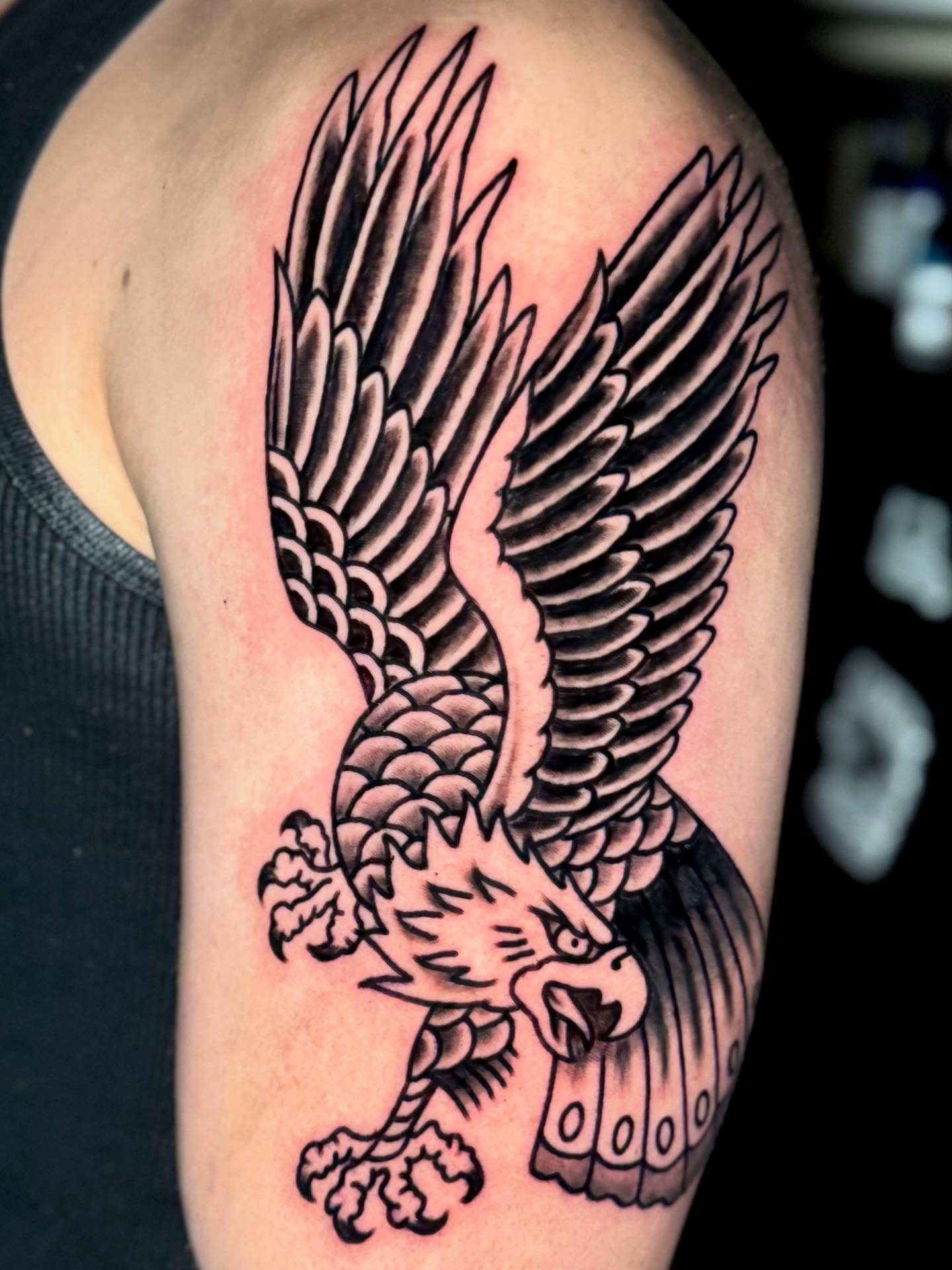 Eagle American traditional tattoo on the shoulder by Henry Bubula, Minneapolis, Minnesota