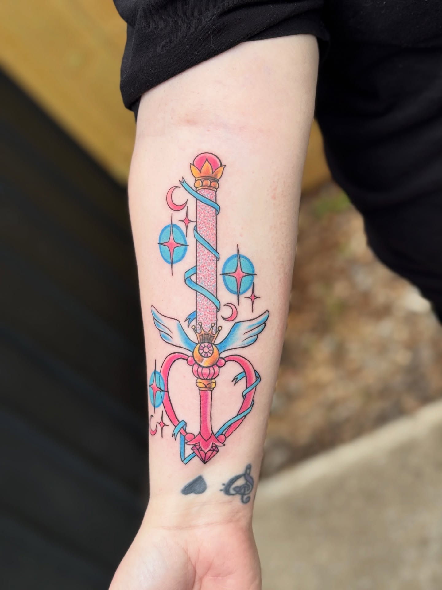 Sword and celestial symbols new school tattoo on the forearm by ⓒⓨⓡⓤⓢ