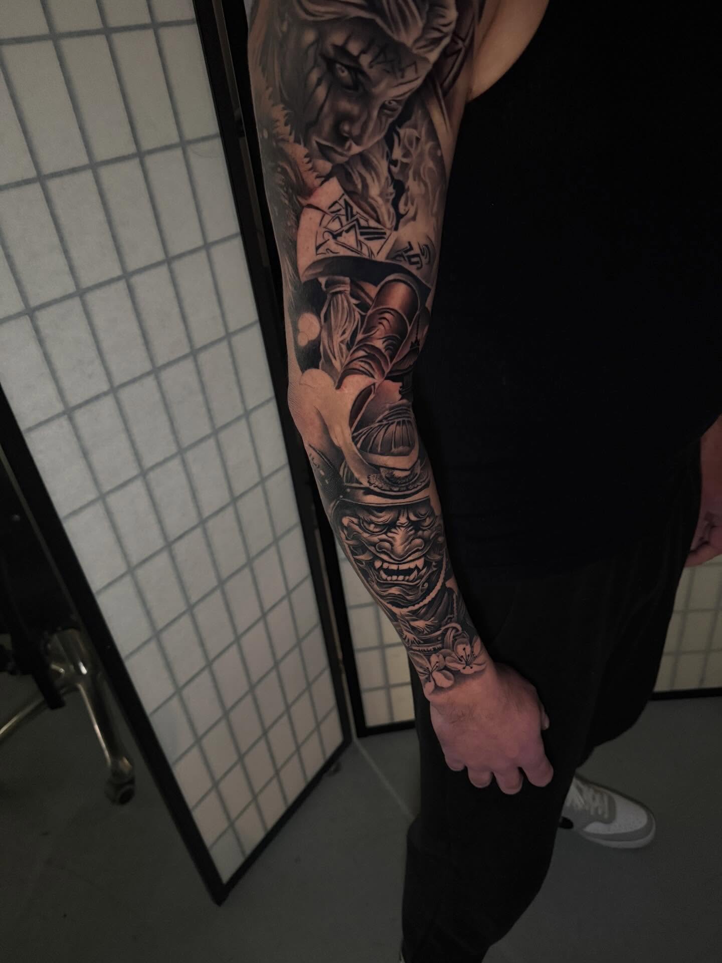 Samurai warrior realism tattoo on the forearm by Miles Johnson