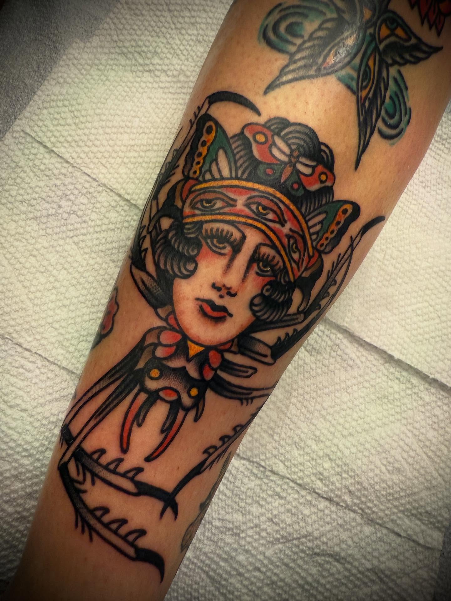 Woman with crown American traditional tattoo on the forearm by Andrew Slater