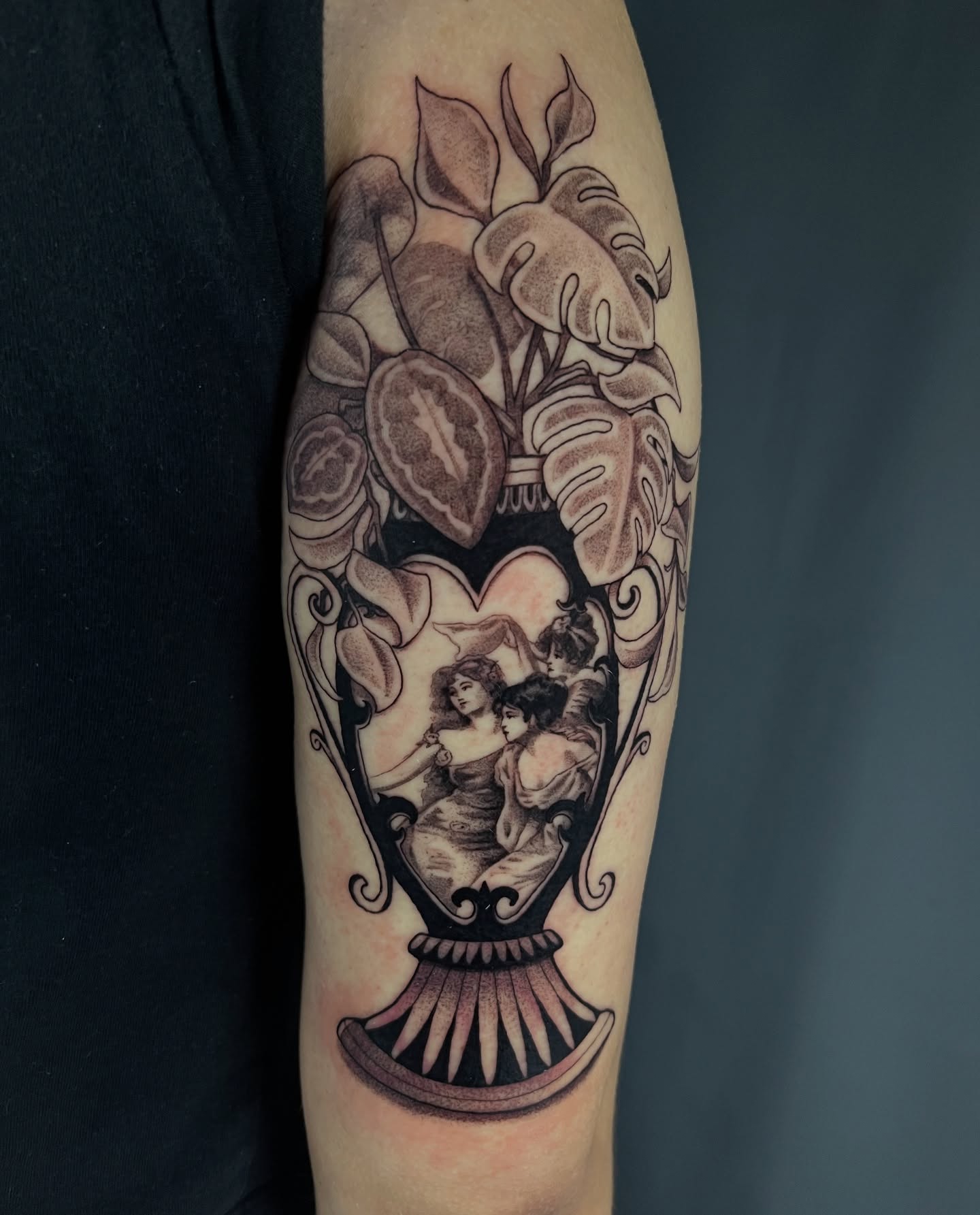Floral arrangement with figures black and grey tattoo on the forearm by Odi ✮⋆˙, Las Vegas, Nevada